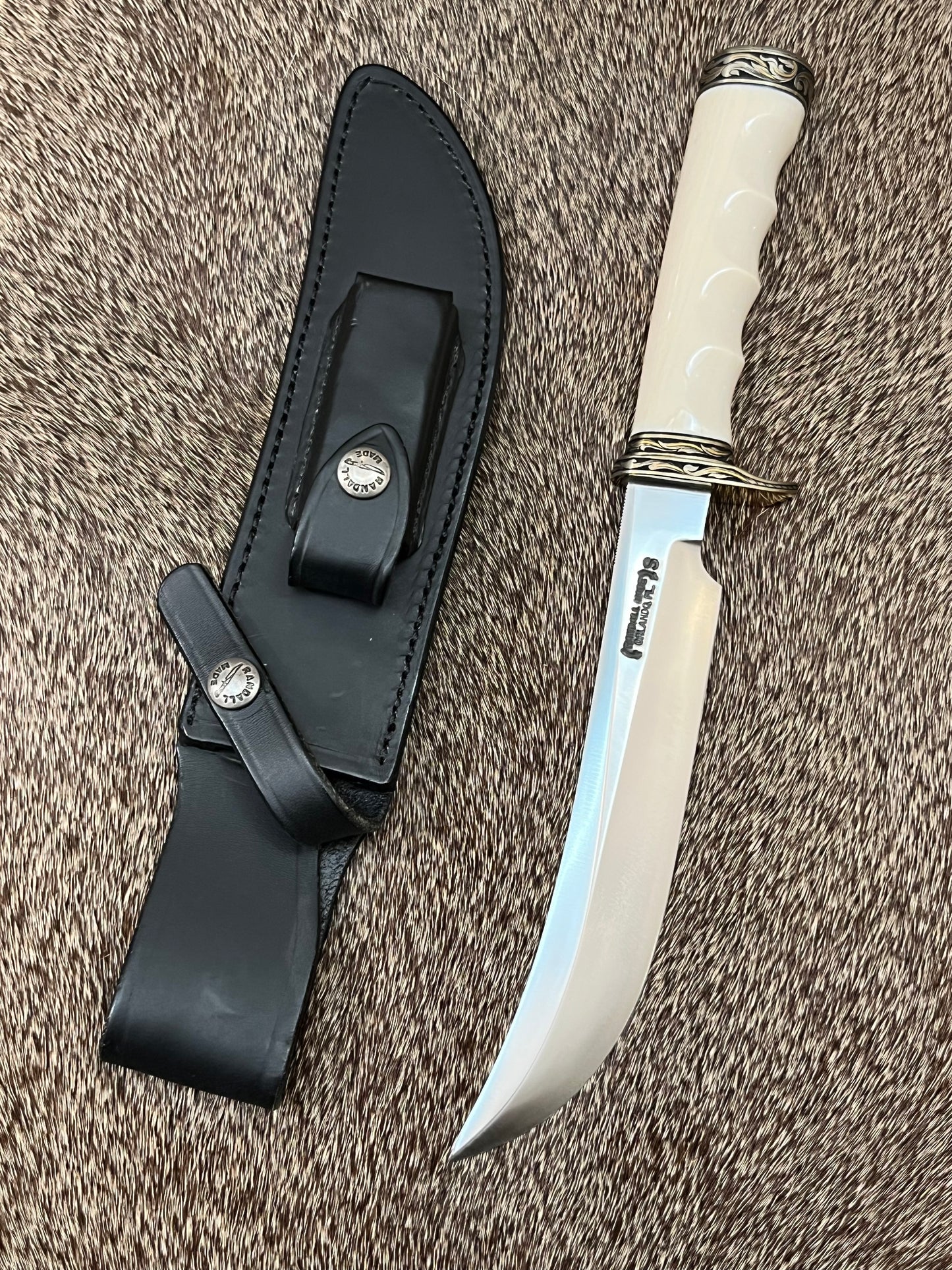 Model 4-7” Big Game and Skinner Elephant Ivory that is Flawless Engraved by Master Engraver Jere Davidson with Gold Inlay Only