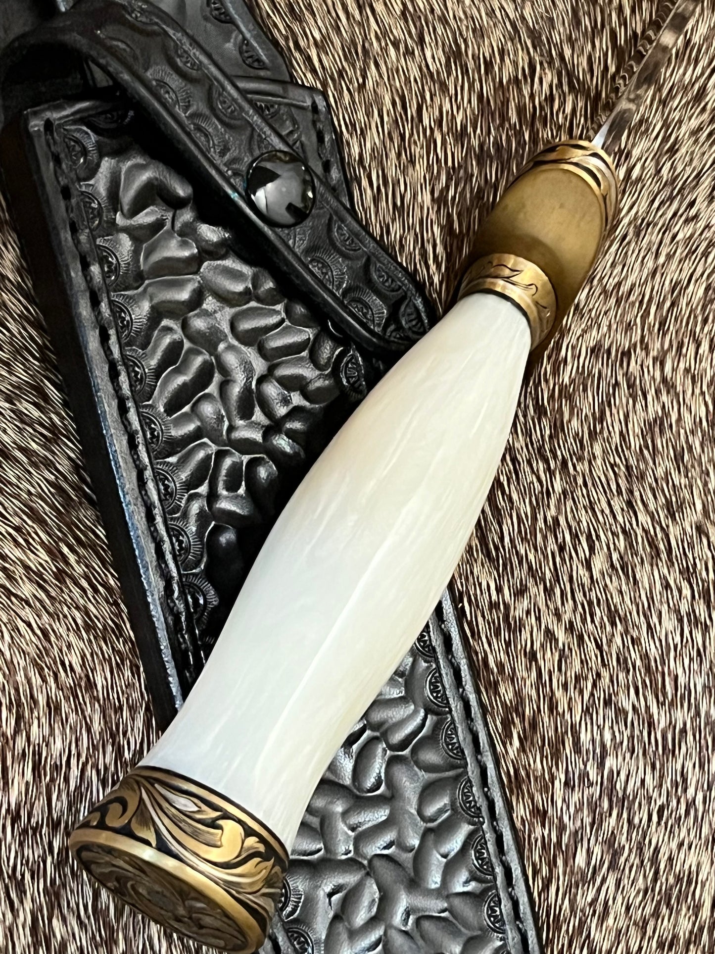 Model 1-7” All Purpose Fighting Knife, Engraved by Master Engraver Jere Davidson with Fine Silver Inlays, comes with Custom Black Leather Tooled Gutcher Sheath