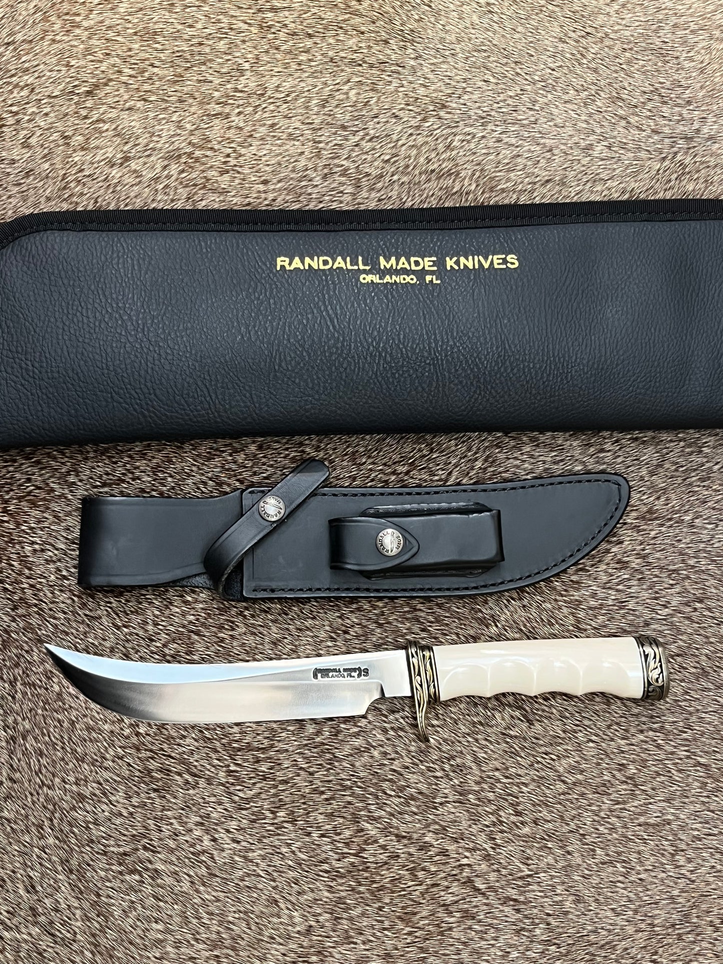 Model 4-7” Big Game and Skinner Elephant Ivory that is Flawless Engraved by Master Engraver Jere Davidson with Gold Inlay Only