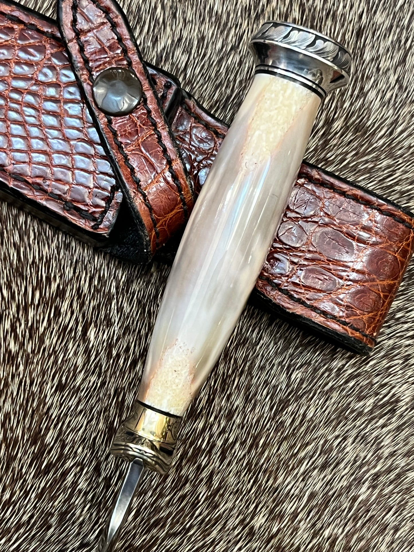 Model 2-5” Fossil Walrus with Custom Gutcher Sheath fully wrapped gloss brown crock, Engraving artist unknown, looks a lot like Ron Skaggs work