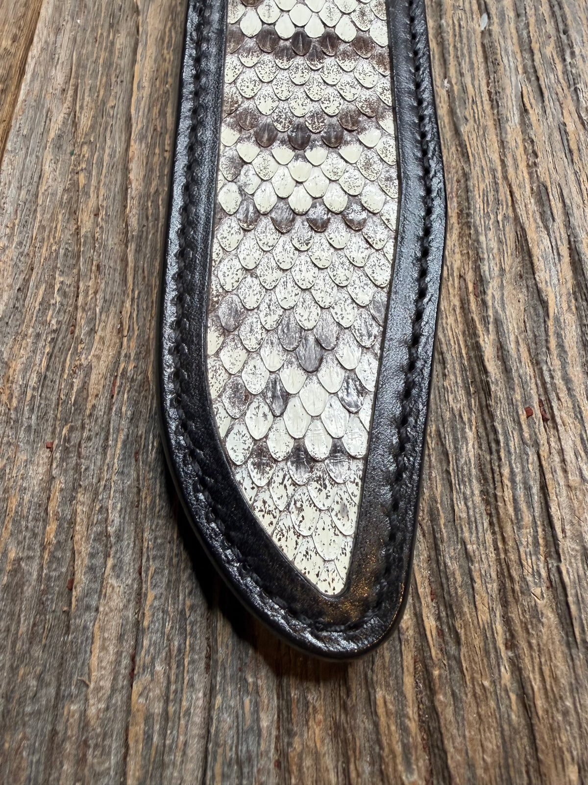 Randall Model 1-7 sheath with an Eastern Diamondback RattleSnake skin from Treeman Sheaths. Hand tooled belt loop, canteen snap. One the hardest skins to source.