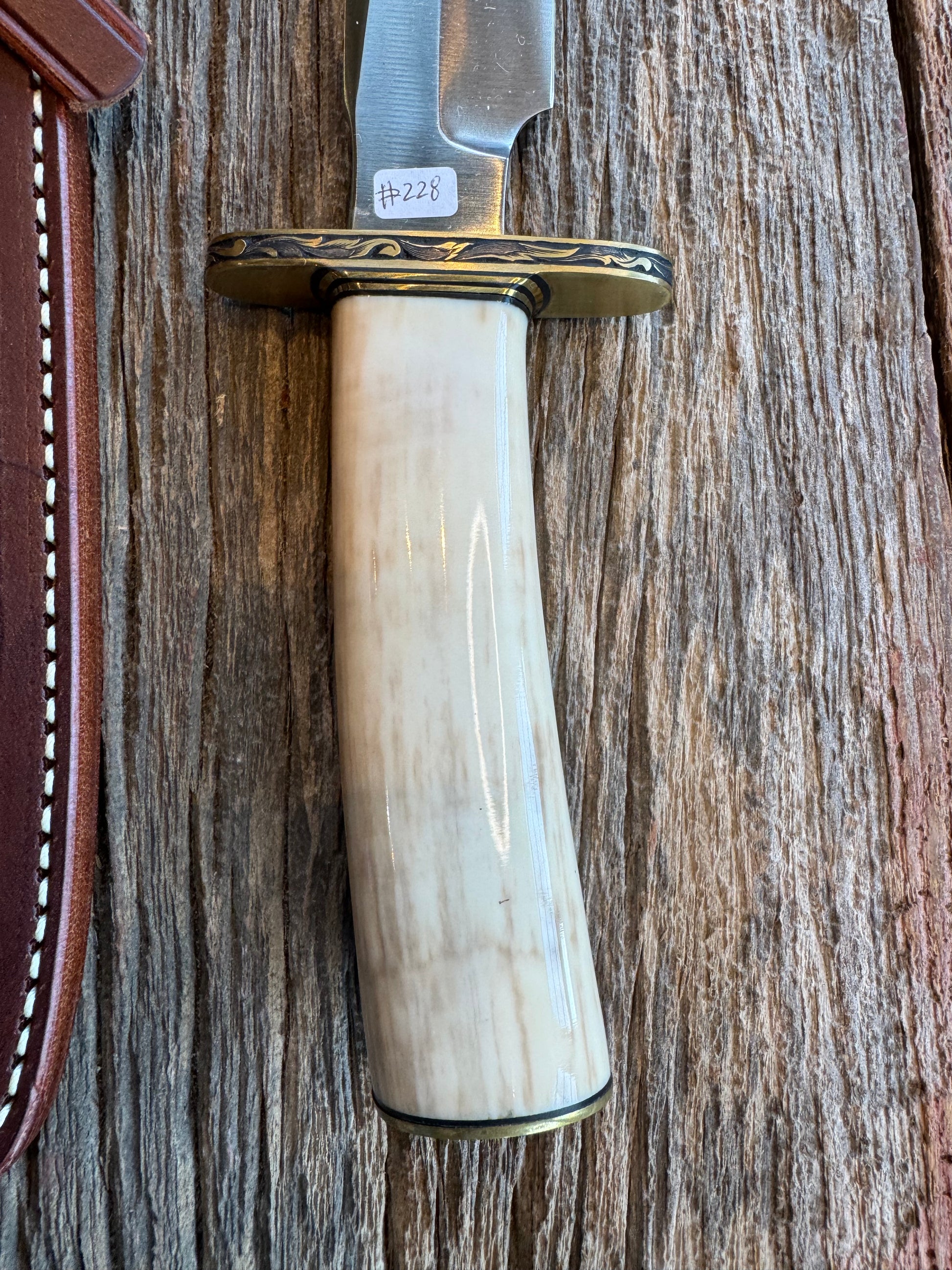 Randall Knife Model 1-7 FWI Handle. Jere Davidson engraved into Brass. Stainless Steel Blade. Stunning knife.