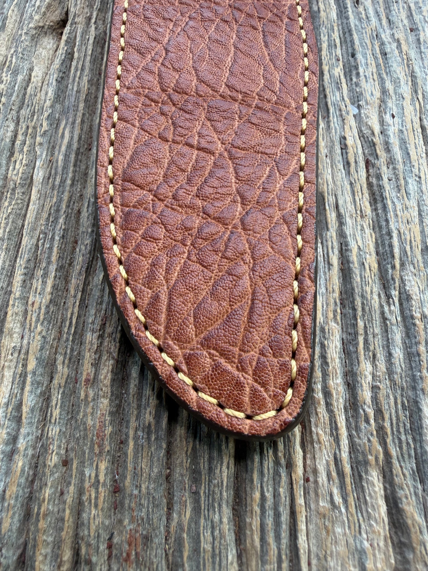 New Randall Model 1-8 Sheath in Exotic thick and textured Rust colored Elephant hide on brown leather from Treeman with a silver Canteen snap. Hand tooled belt loop. Killer sheath.