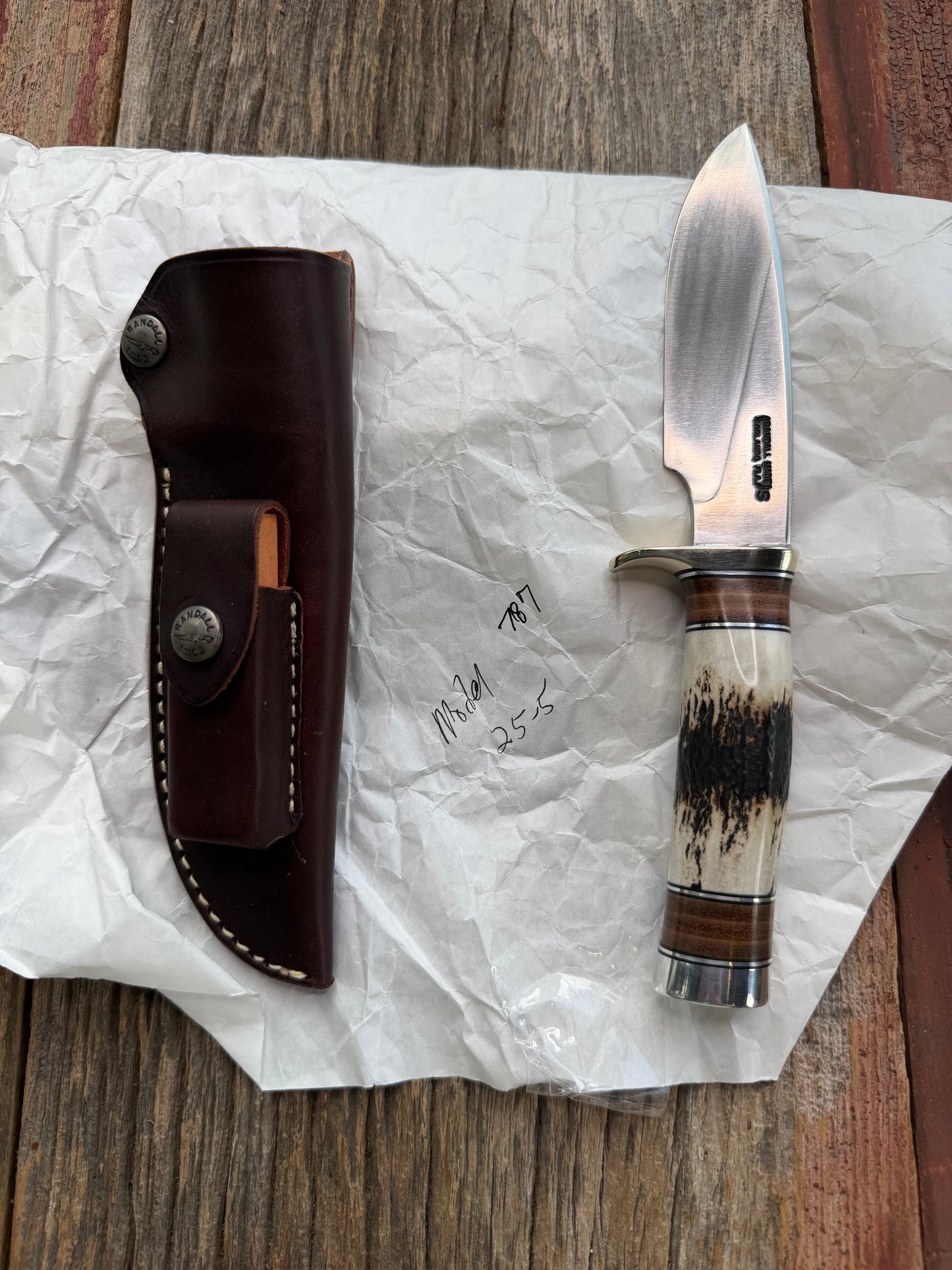 New in paper Randall Knife Model 25-5 Trapper in Stag Leather Handle Stainless Blade, NSH Hilt
