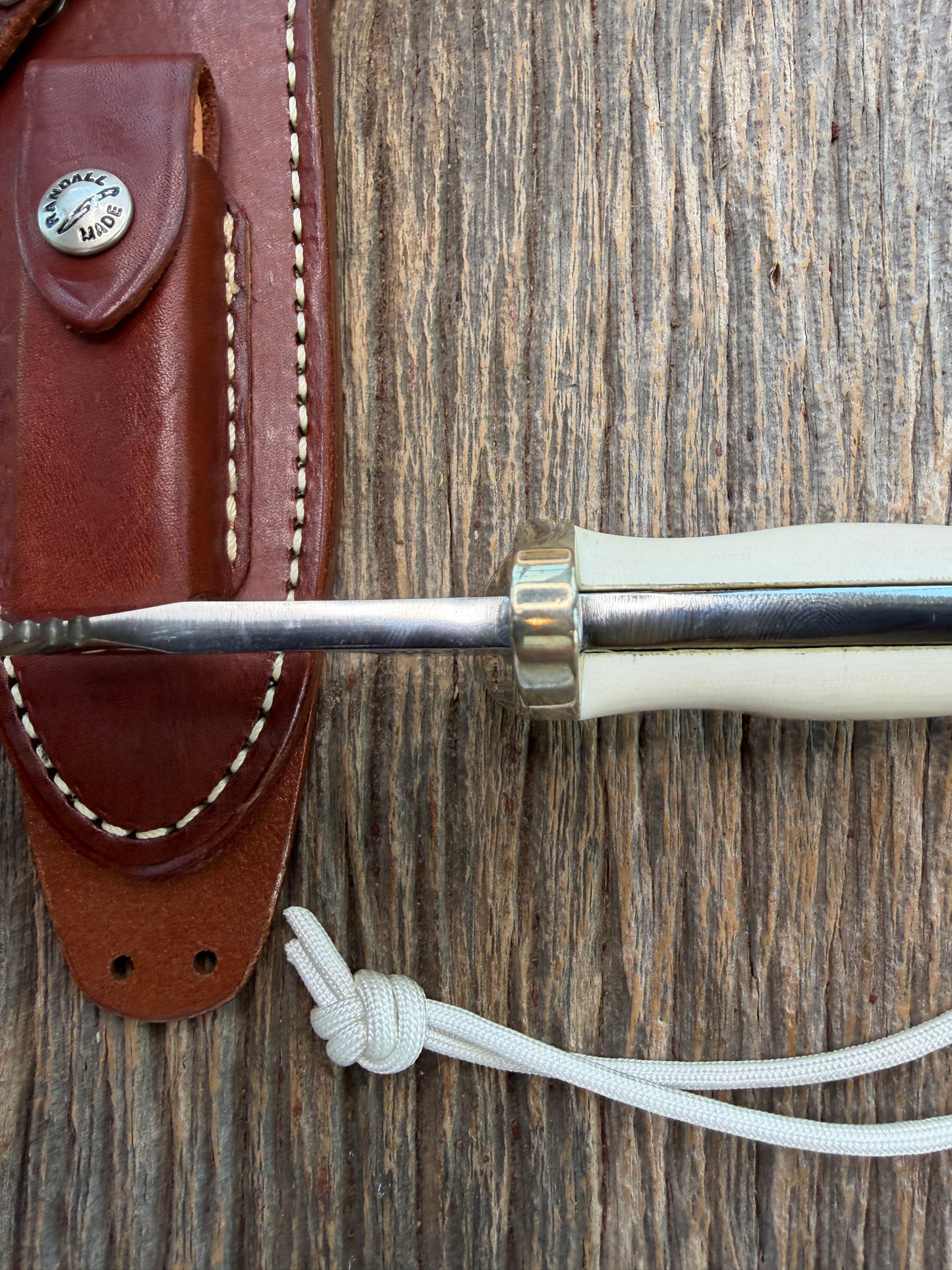 Randall Model 15-5 1/2 Airman White Ivorite Handle Stainless Nickel Silver Hilt Sawteeth Lanyard