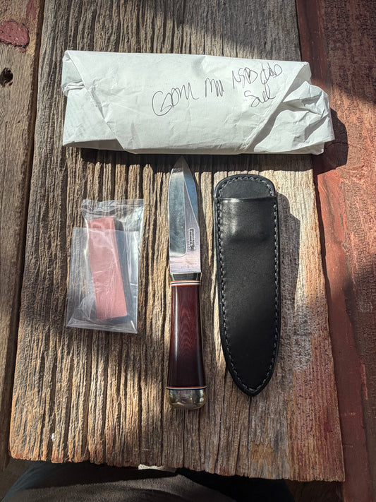 New in Paper Randall Model “Gambler” 4 Inch in a Maroon Micarta handle, Nickel hilt, Stainless steel blade, rounded nickel silver butt cap.