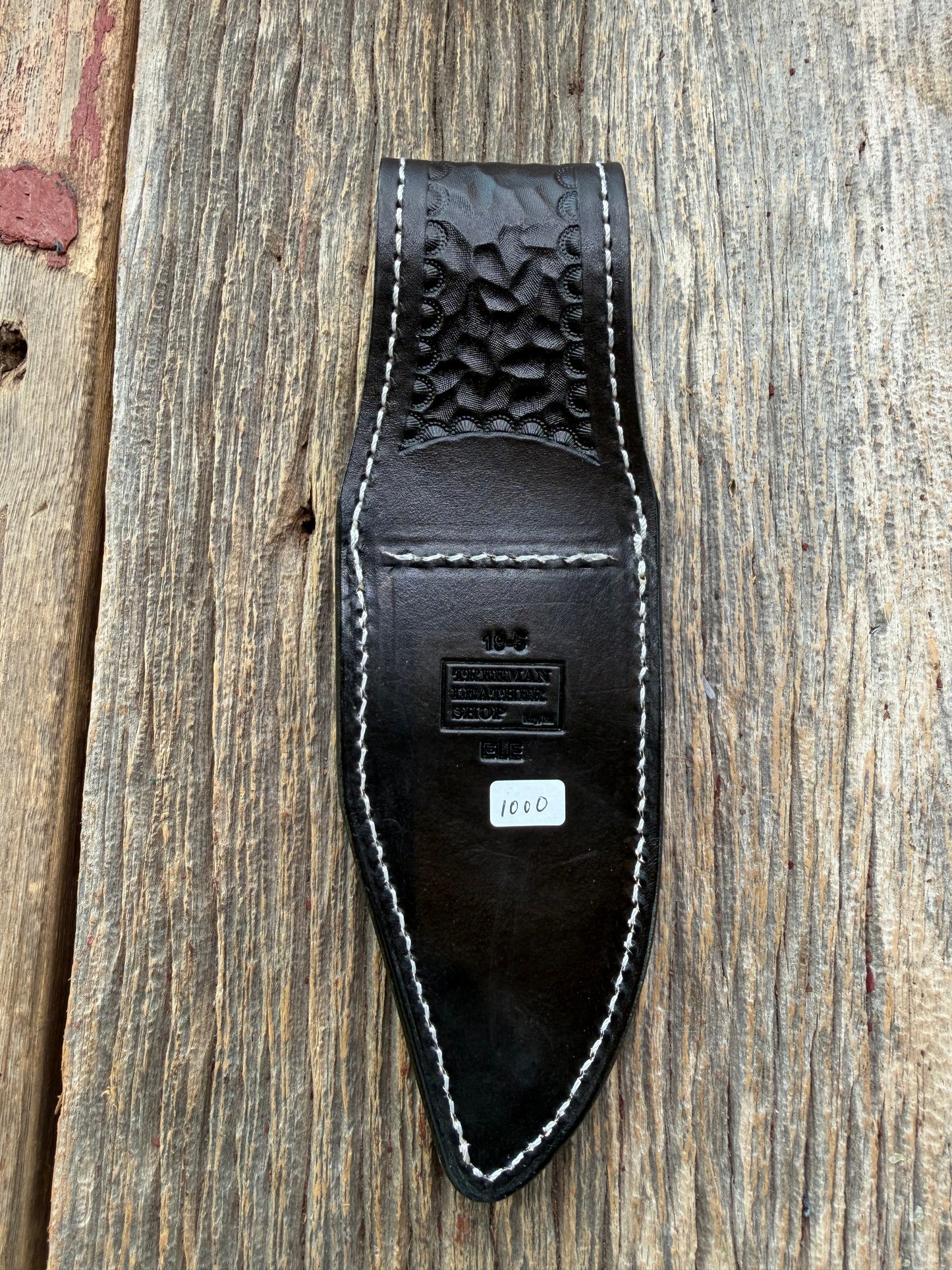 New Randall Model 19-5 Sheath in Exotic thick and textured Black Elephant hide on black leather from Treeman with a black Canteen snap. Hand tooled belt loop. Killer sheath.