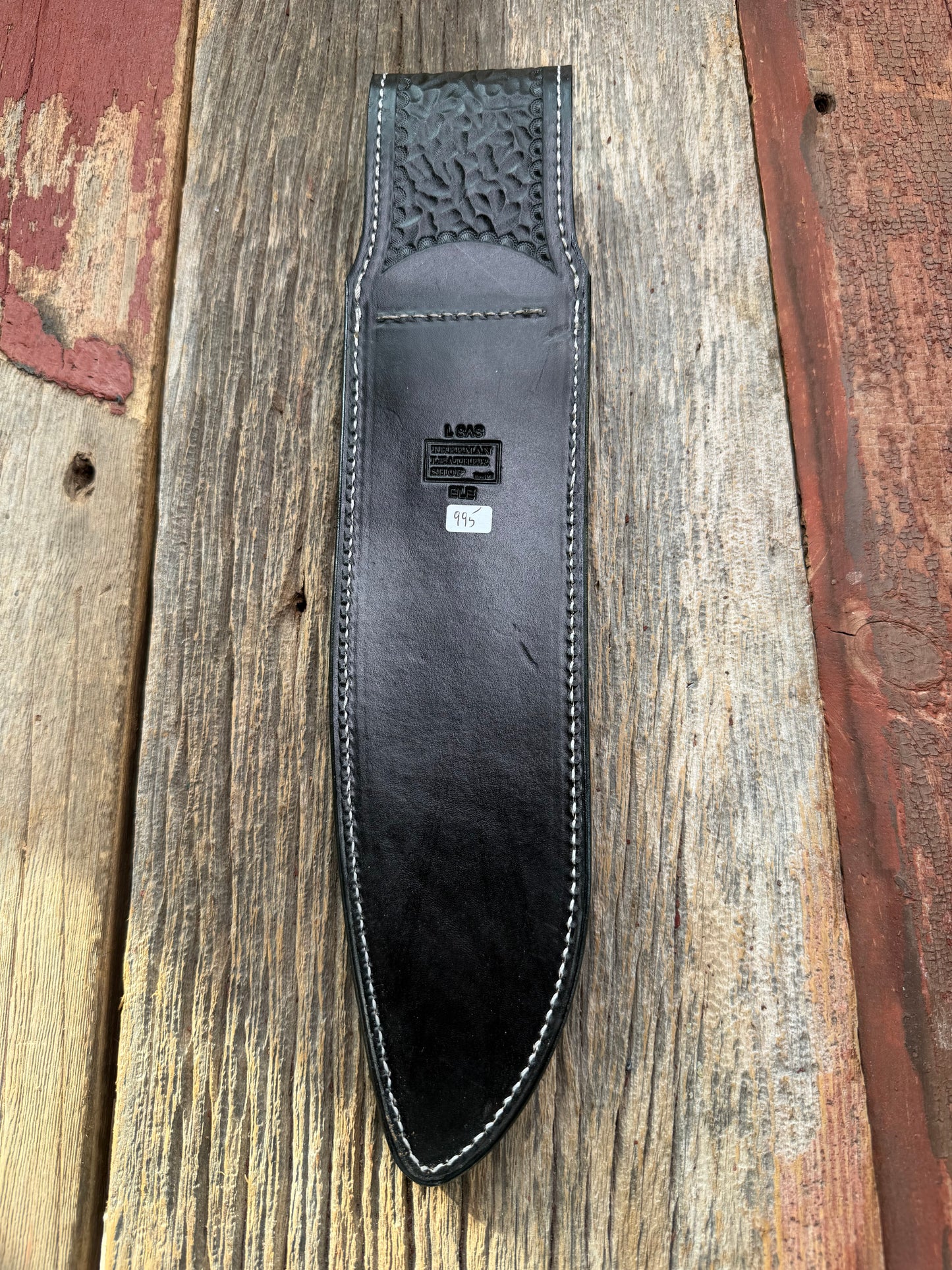 New Randall Model 12-11 Large Sasquatch Sheath in Exotic thick and textured Black Elephant hide on black leather from Treeman with a black Canteen snap. Hand tooled belt loop. Killer sheath.
