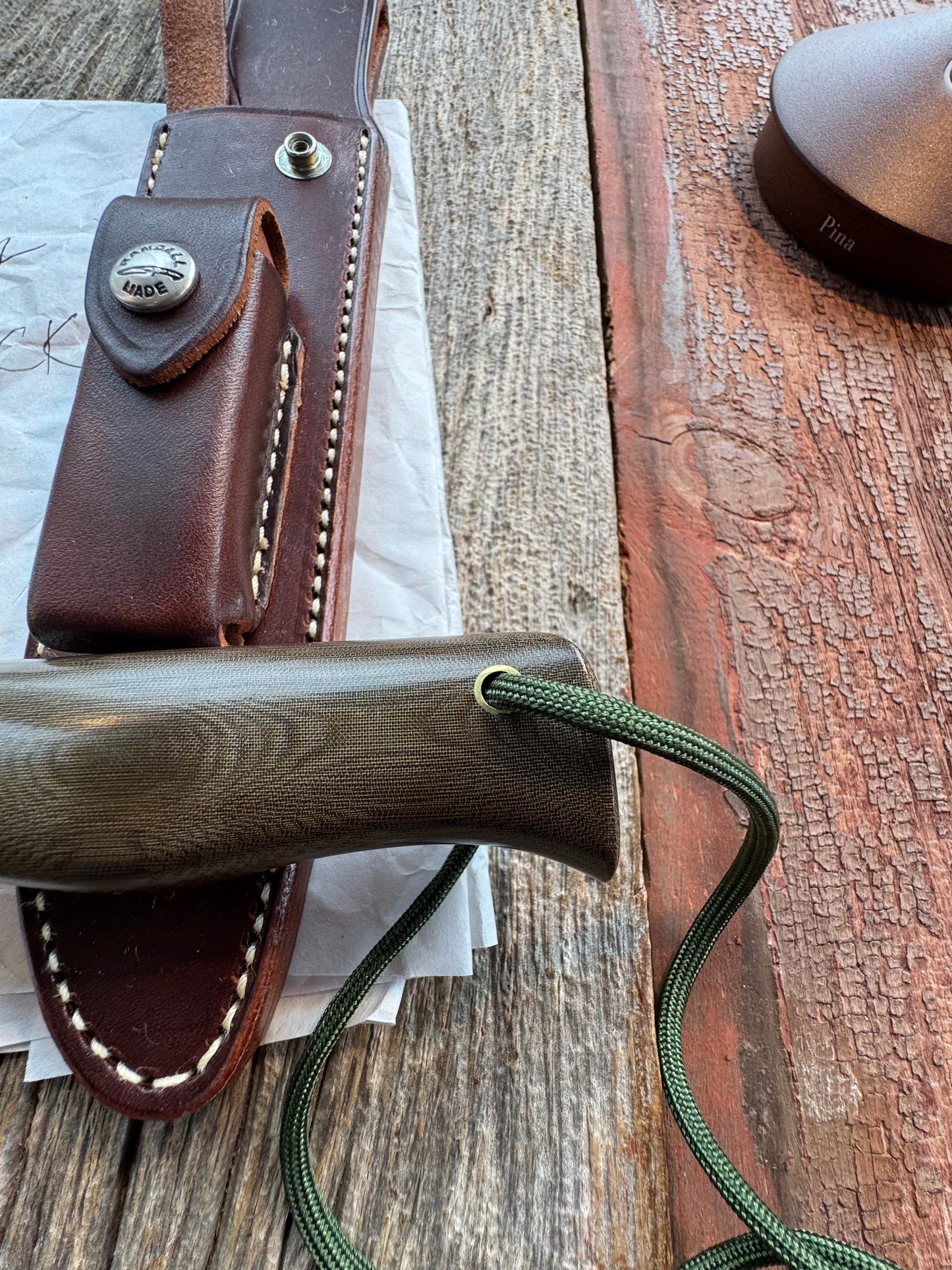 New in Paper Randall Model 16 SP#1 Special fighter with a Green Micarta handle. SS blade, Brass hilt. Lanyard. Brown leather sheath.