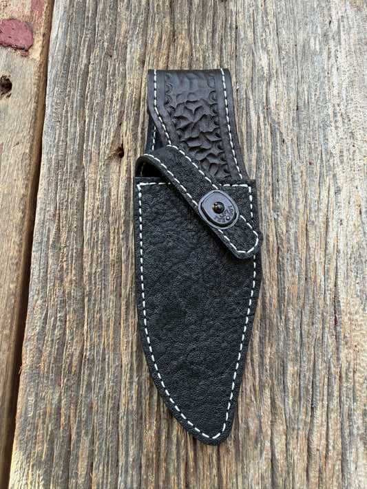 New Randall Model 19-5 Sheath in Exotic thick and textured Black Elephant hide on black leather from Treeman with a black Canteen snap. Hand tooled belt loop. Killer sheath.