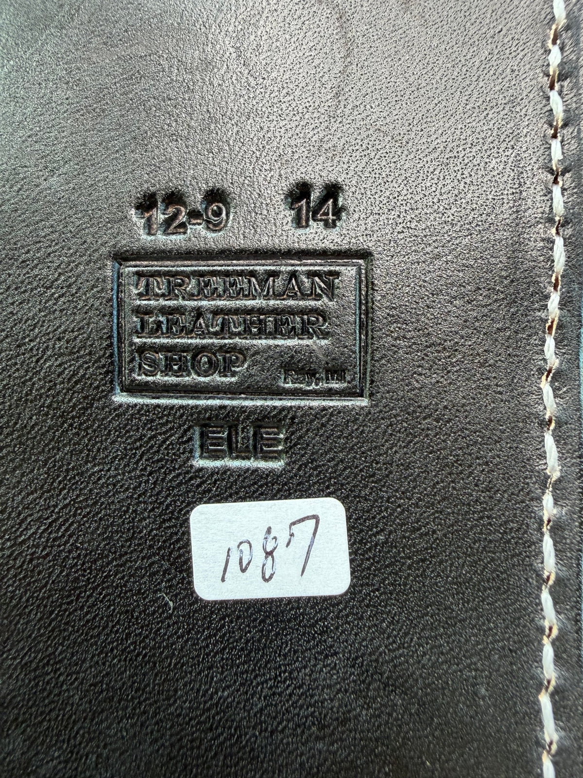 New Randall Model 12-9 Sheath in Exotic Black Matte Elephant Hide from Treeman with a Black Canteen snap. White thread deviated stitching on black leather..Killer sheath.