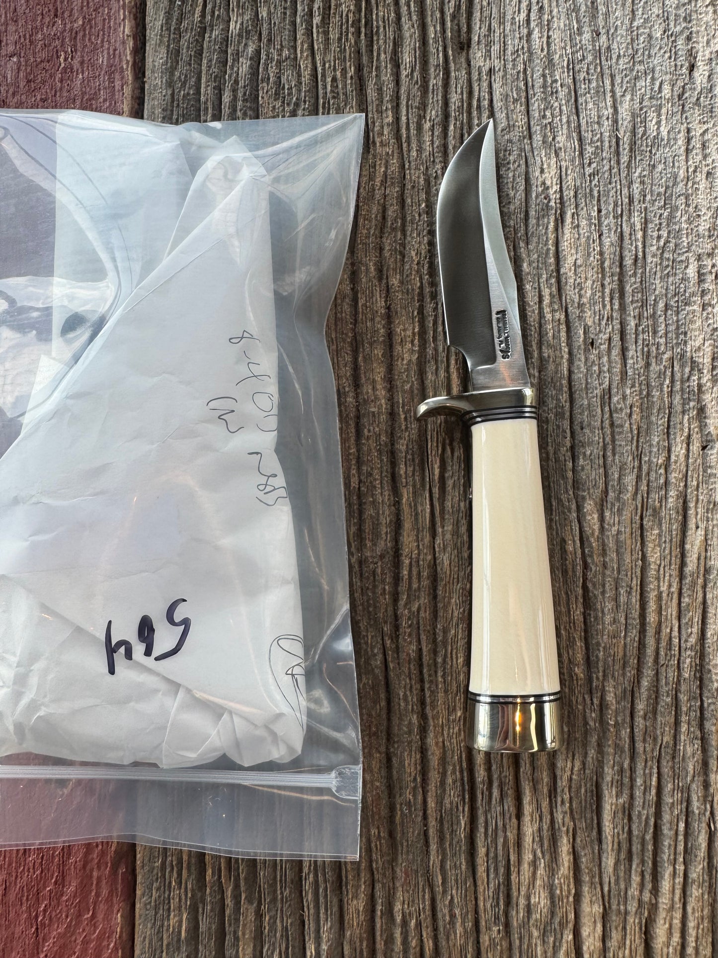 New in paper Randall Model 8-4 with a nice piece of customer supplied Dave Warthers Resin, Stainless Steel, Nickel Silver Single Hilt and butt cap.