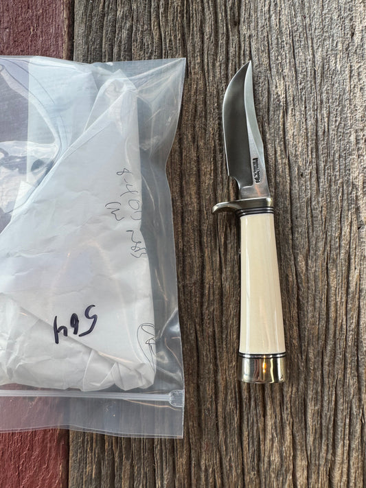 New in paper Randall Model 8-4 with a nice piece of customer supplied Dave Warthers Resin, Stainless Steel, Nickel Silver Single Hilt and butt cap.