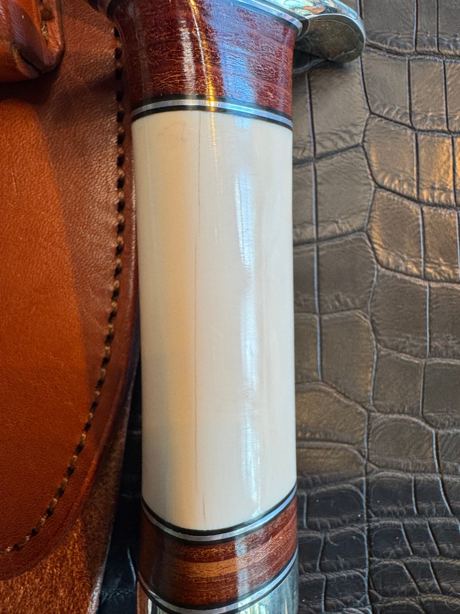 Randall Model 12/9-14 Grind Sportsman Bowie in Elephant Ivory with stacked Leather, Nickel Silver Hilt and Butt cap.