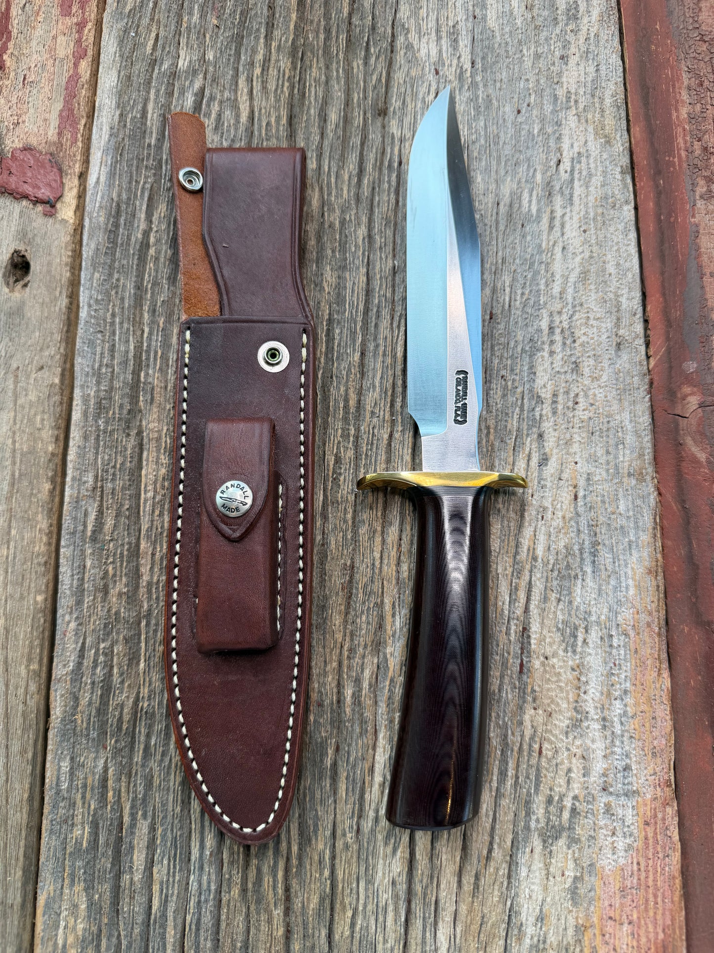 New in Paper Randall Model 1-7 Maroon Micarta Brass Hilt, Natural end, single black spacer, carbon steel.