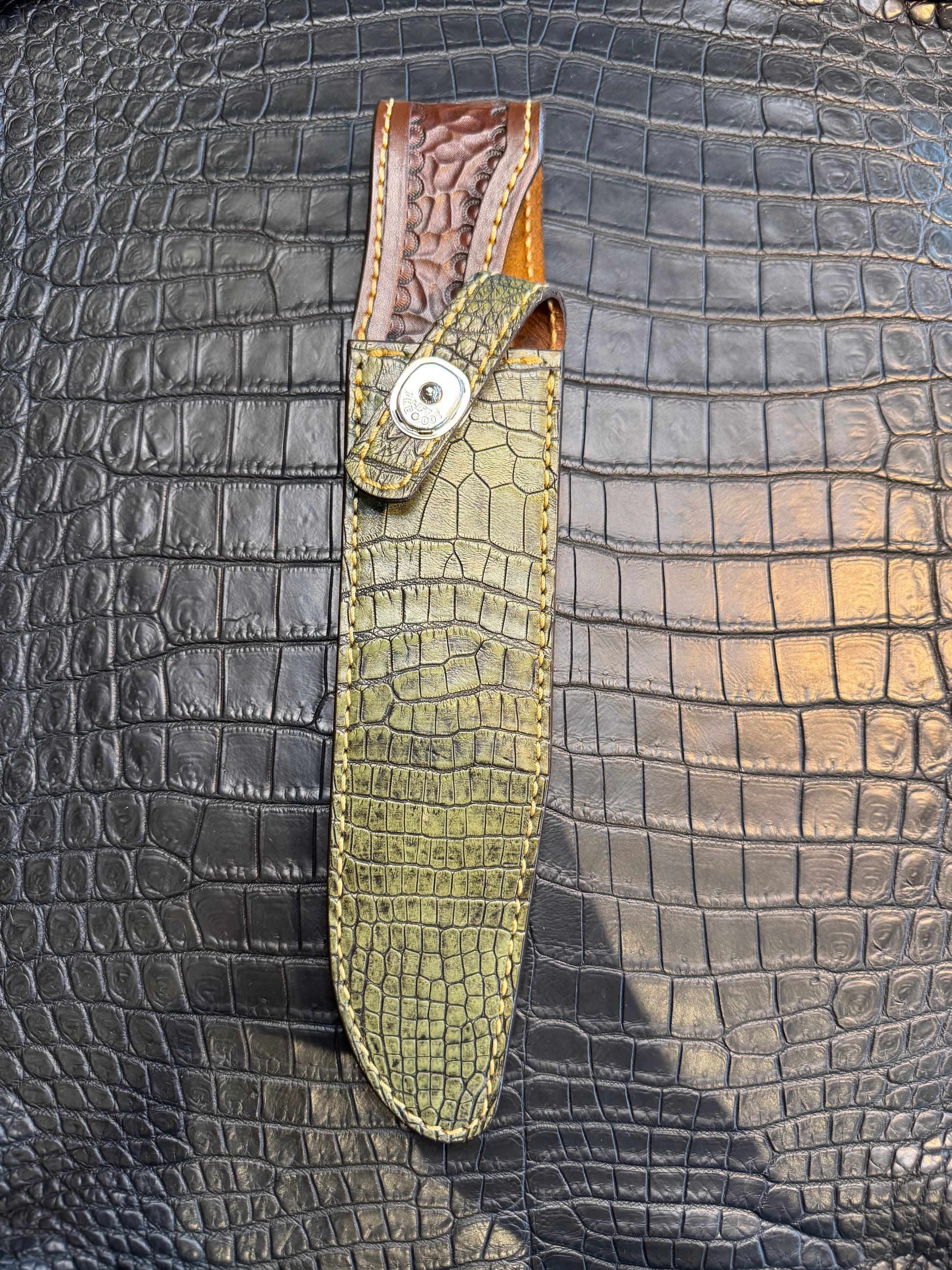 Randall Model 1-8 in Army Green Crocodile. Straight hilt, Canteen Snap, full brass stamping and stitching.