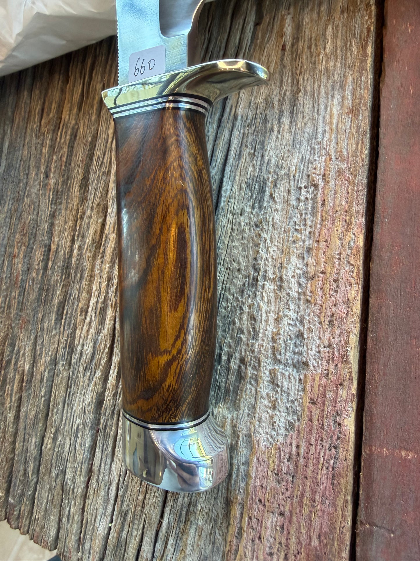 New in Paper Randall Model 19-5 with a nice piece of Ironwood. Nickel silver Hilt and Aluminum crows beak Butt cap.