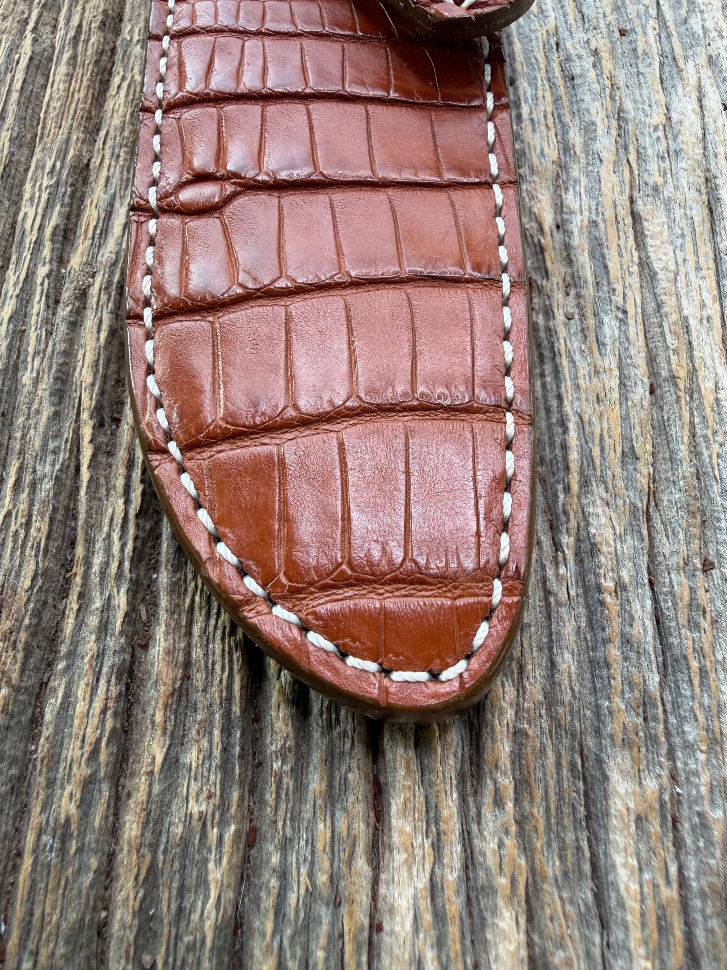 New Randall Model 23 Sheath in Exotic thick and textured Honey Crocodile skin on brown leather from Treeman with a silver Canteen snap. Hand tooled belt loop. Killer sheath.