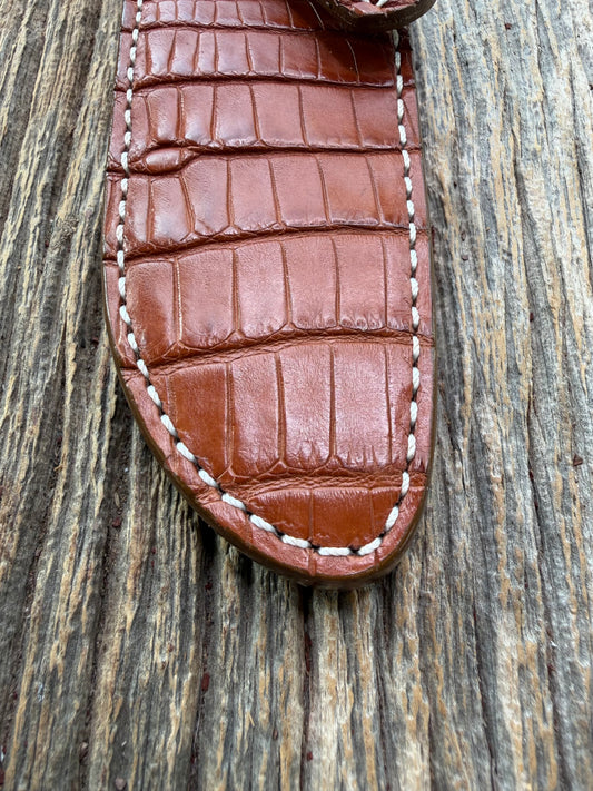New Randall Model 23 Sheath in Exotic thick and textured Honey Crocodile skin on brown leather from Treeman with a silver Canteen snap. Hand tooled belt loop. Killer sheath.
