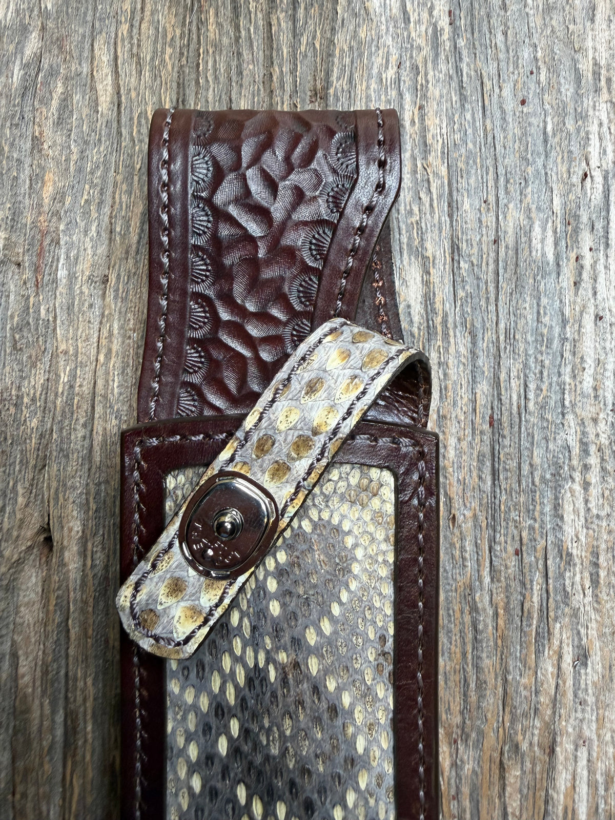 Randall Model 12-8 sheath with an Eastern Diamondback RattleSnake skin from Treeman Sheaths. Hand tooled belt loop, canteen snap. One of the hardest skins to source.
