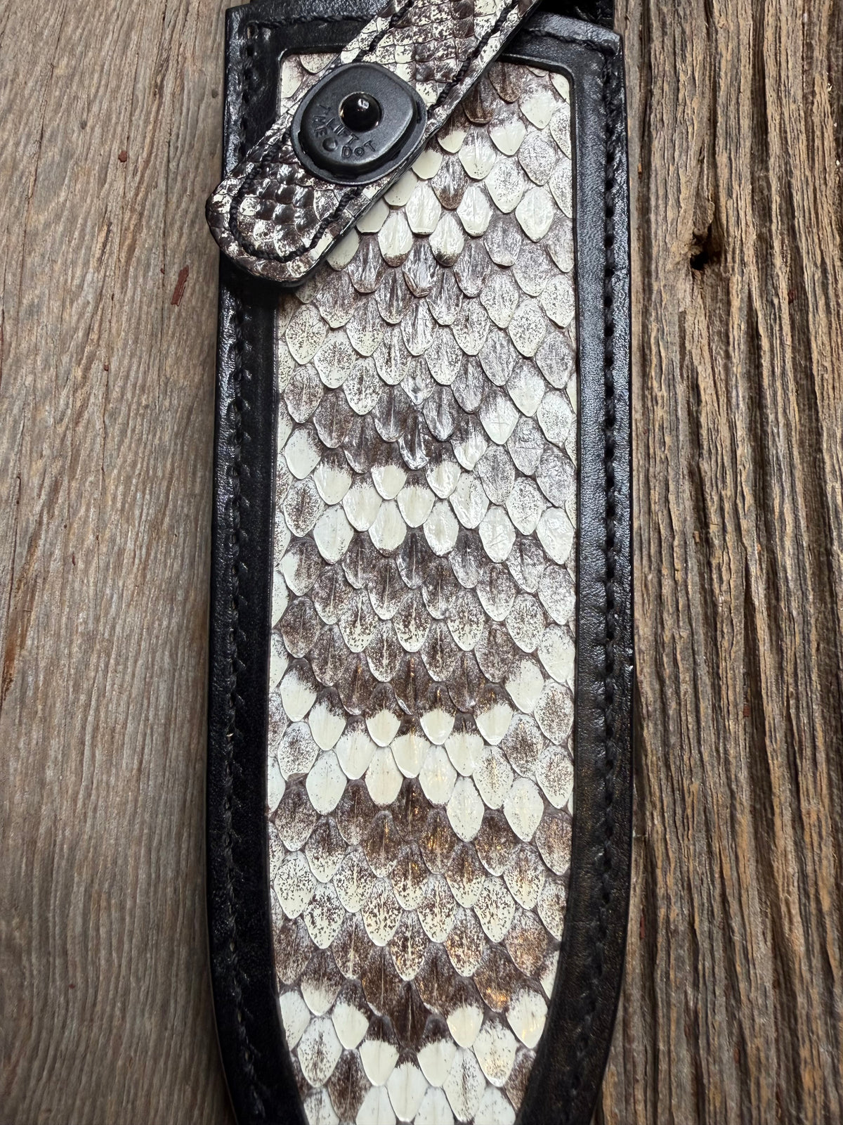 Randall Model Clinton Special sheath with an Eastern Diamondback RattleSnake skin from Treeman Sheaths. Hand tooled belt loop, canteen snap. One the hardest skins to source.
