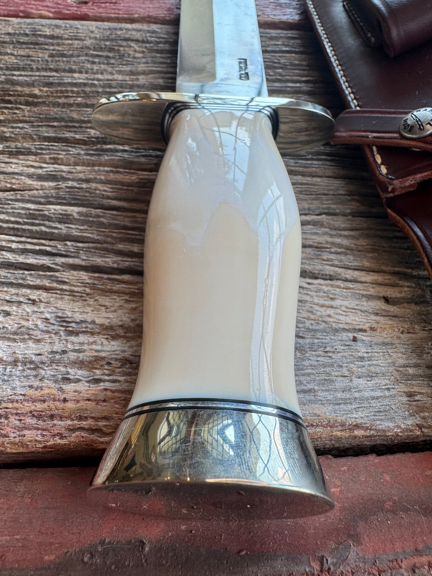 New in Paper Model 12-11 Confederate Bowie. Beautiful creamy Fossil Walrus Ivory with a Nickel  Silver forward curved hilt and butt cap. Unreal Scrim opportunity!! Blank Canvas..