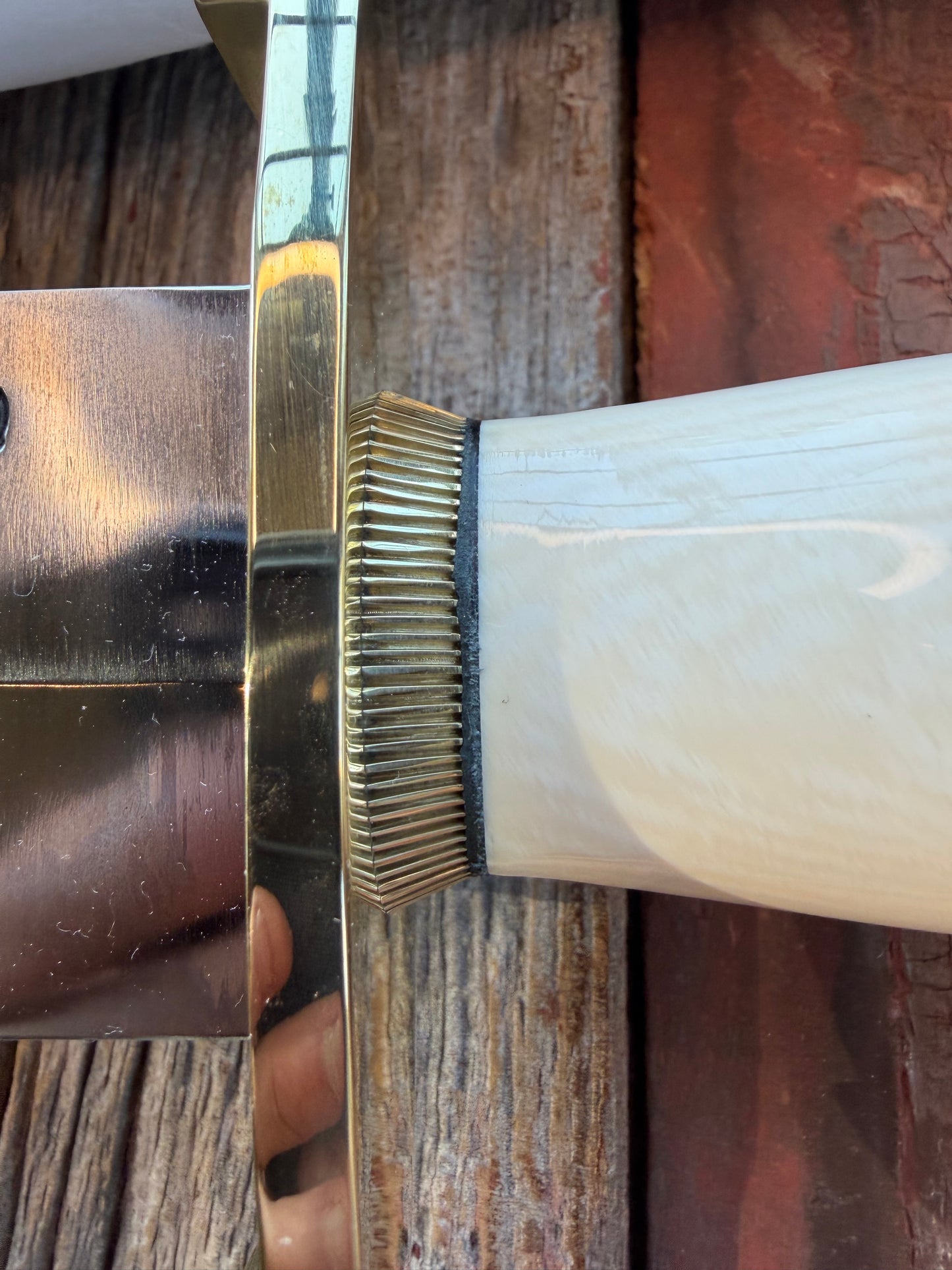 New in Paper Model 12-11 Smithsonian “ Smitty” Beautiful Dave Warthers Resin with a Brass Lugged hilt and Scalloped brass collar and scalloped coolie butt cap.