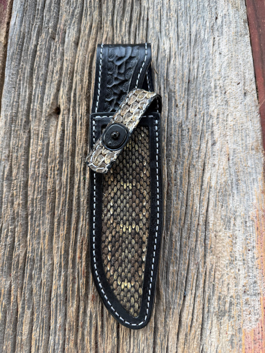 Randall Model 1-6 sheath with inlayed Western Diamondback RattleSnake skin from Treeman Sheaths. Brown leather, white deviated stitching and black canteen snaps.