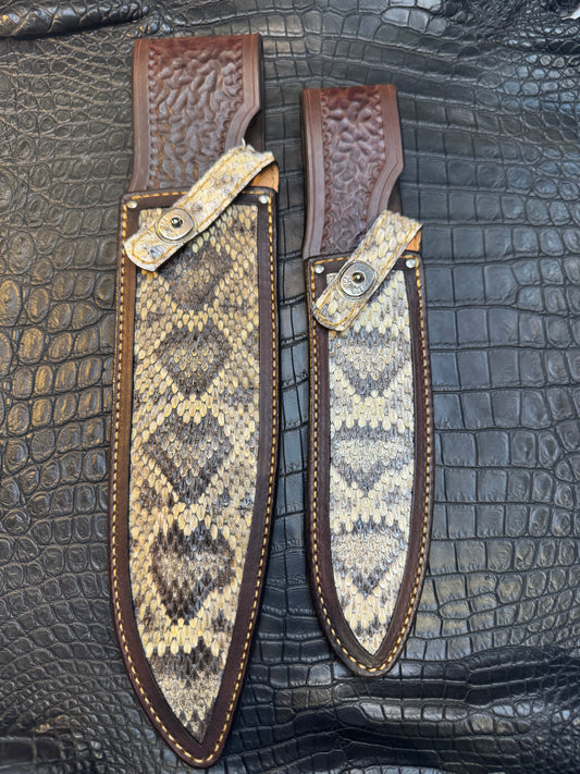 A pair of Randall Model 12-11 Large Sasquatch and Randall Model 12-8 Small Sasquatch Sheaths in Exotic Vibrant Diamond Pattern Rattlesnake skin by Treeman.