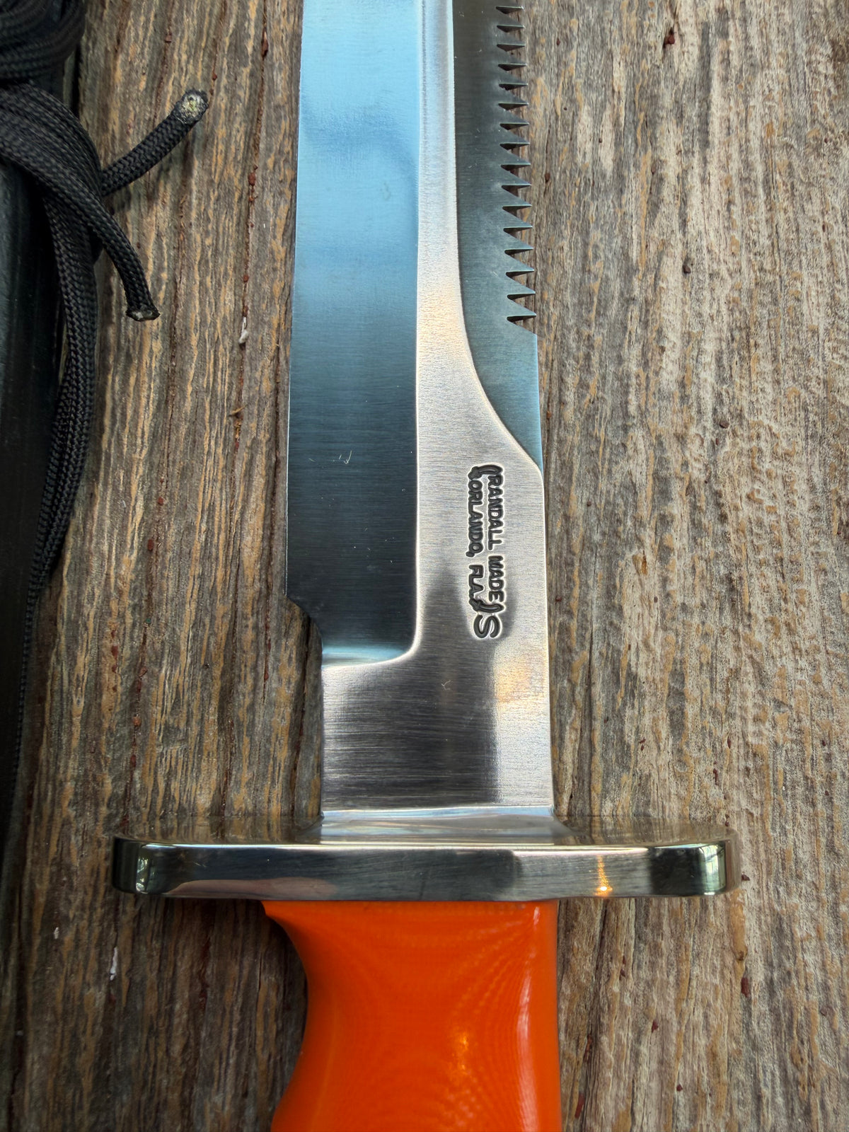 New in Paper Randall Model 14-7.5 with an Orange G10 Micarta Handle. Single Finger grip, SS, Black Sheath, Lanyard and Sawteeth.
