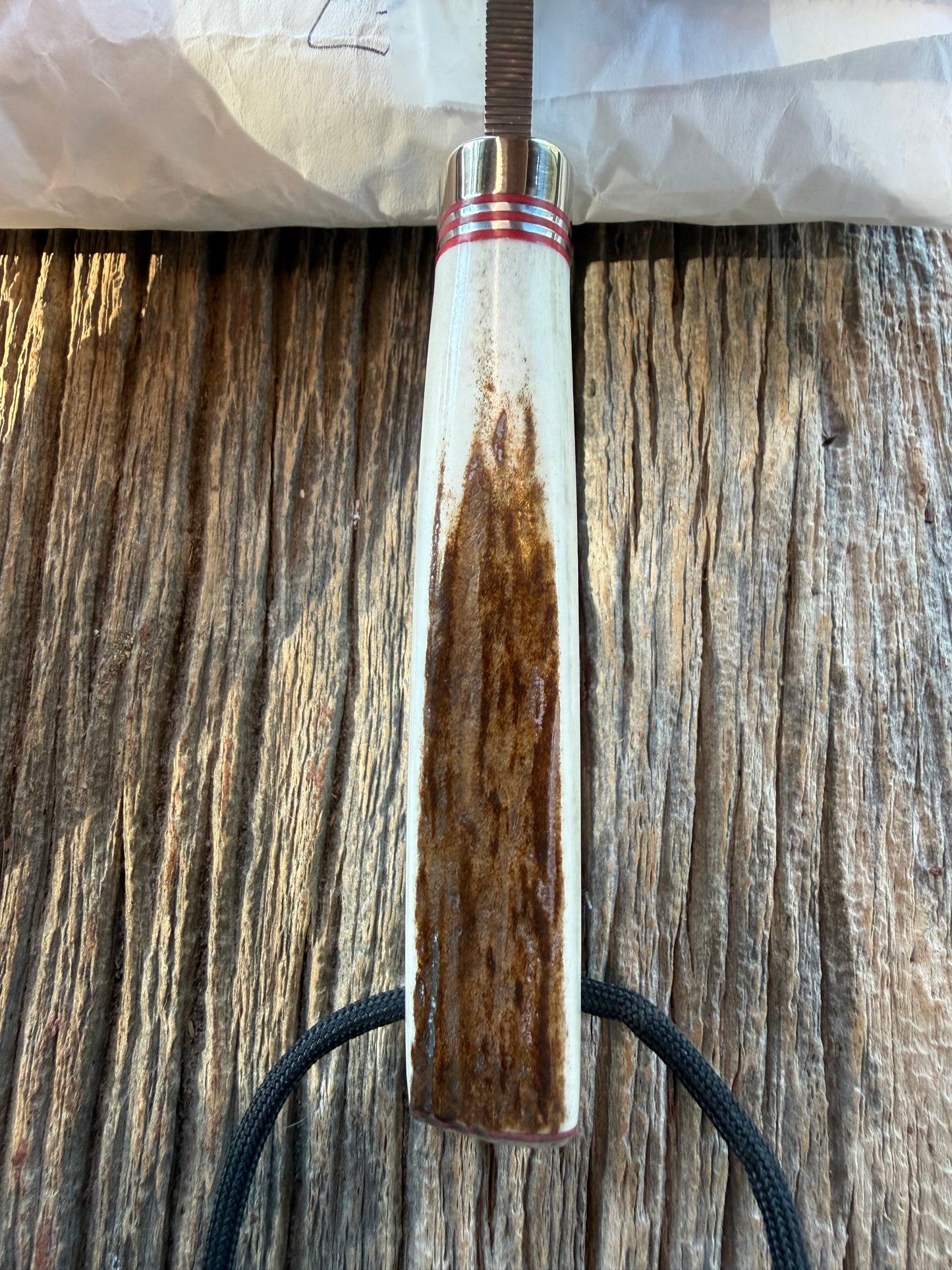 New in Paper Randall Non Catalog Model  Cattleman. Slab side Stag handle. Red and silver spacers. Stainless blade.