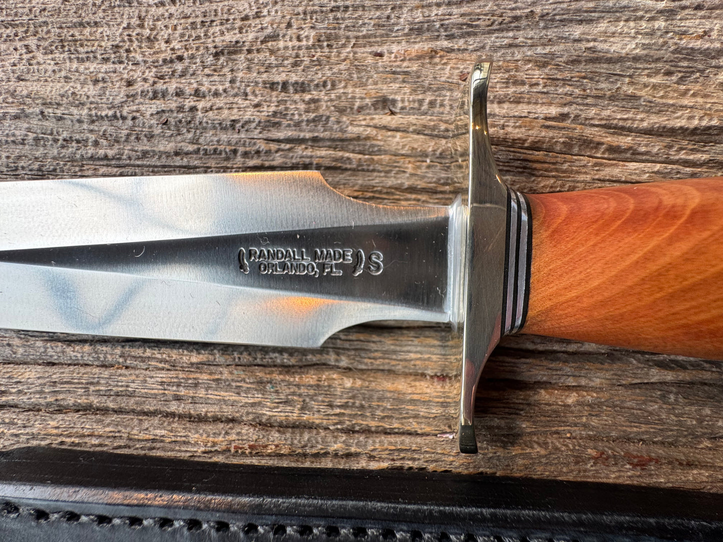 Like new Randall Model 2-8 Stainless steel blade, Nickel silver hilt and butt cap. Black leather sheath. Thuya wood handle.
