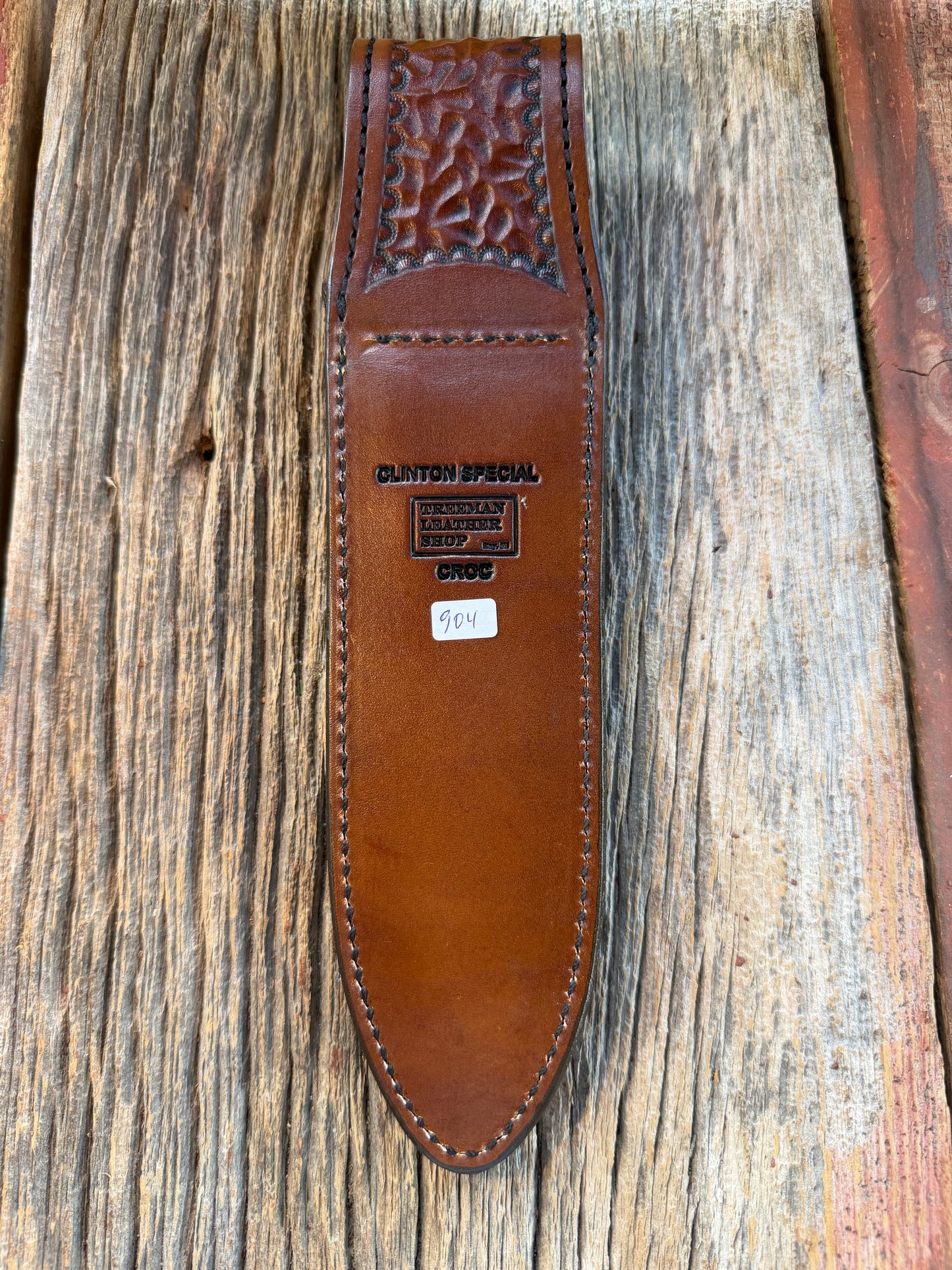 New Randall Model Clinton Special Sheath in Exotic Dark Brown Sueded Crocodile from Treeman with the newest Black Canteen snap.