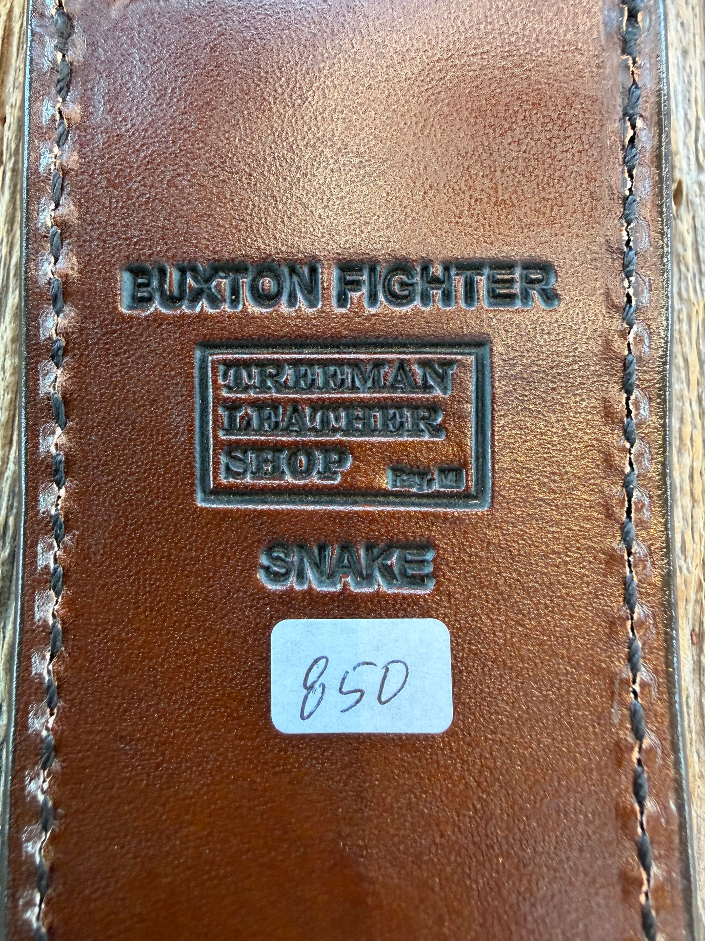 Randall Model Buxton Fighter Special Sheath in Exotic Prairie RattleSnake from Treeman Sheaths. Tremendous colors on this one.