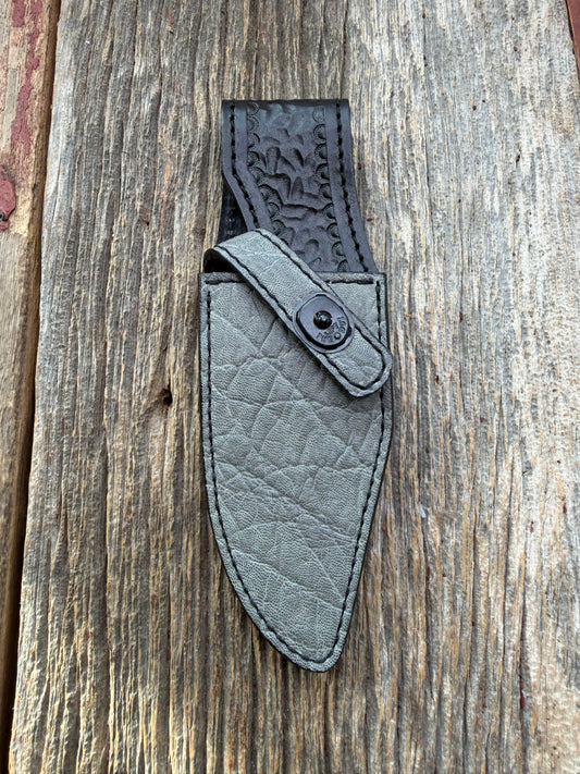 New Randall Model 19-5 Sheath in Exotic thick and textured Grey Elephant Hide on black leather from Treeman with a black Canteen snap. Hand tooled belt loop. Killer sheath.