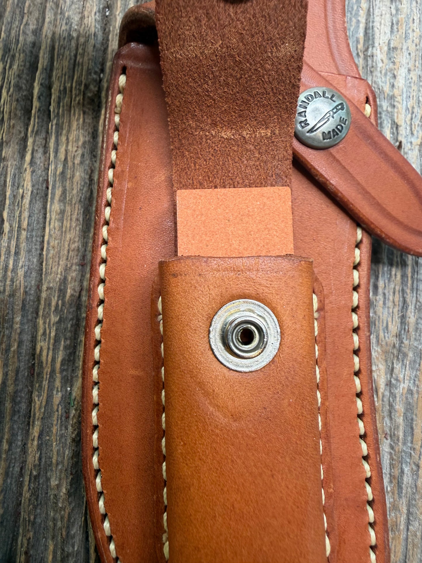 Randall by Gutcher Knife Sheath for a Model Rick Bowles Special.  Randall snaps, pouch with stone. Tuff sheath.