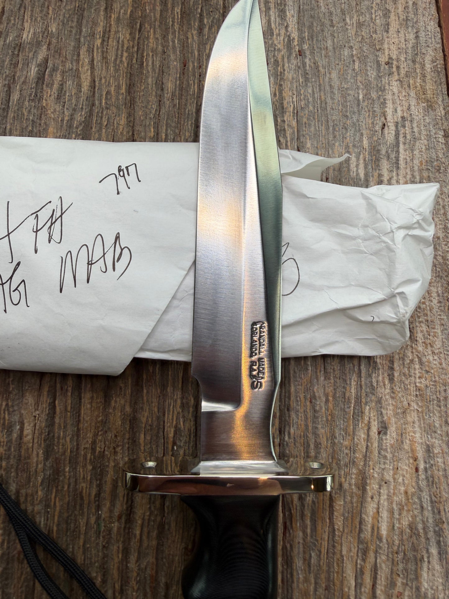 New in Paper Randall Model 16 SP#1 Special fighter with a Black Micarta handle. SS blade, Nickel silver Double hilt. Lanyard. Brown leather sheath.