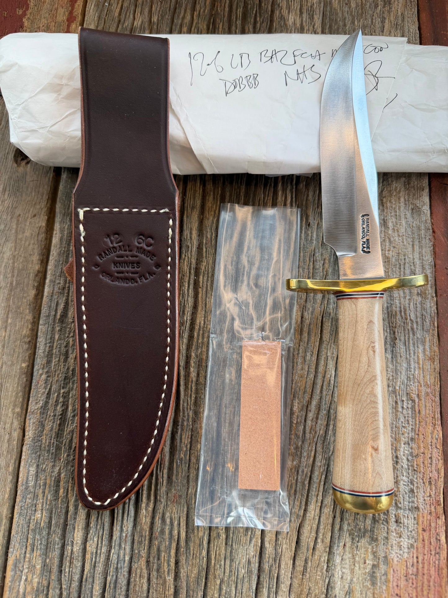 New Paper Randall Made Knife Model 12-6 supplied Maple handle, carbon  blade, brass hilt and rounded butt cap. Red white and blue spacers