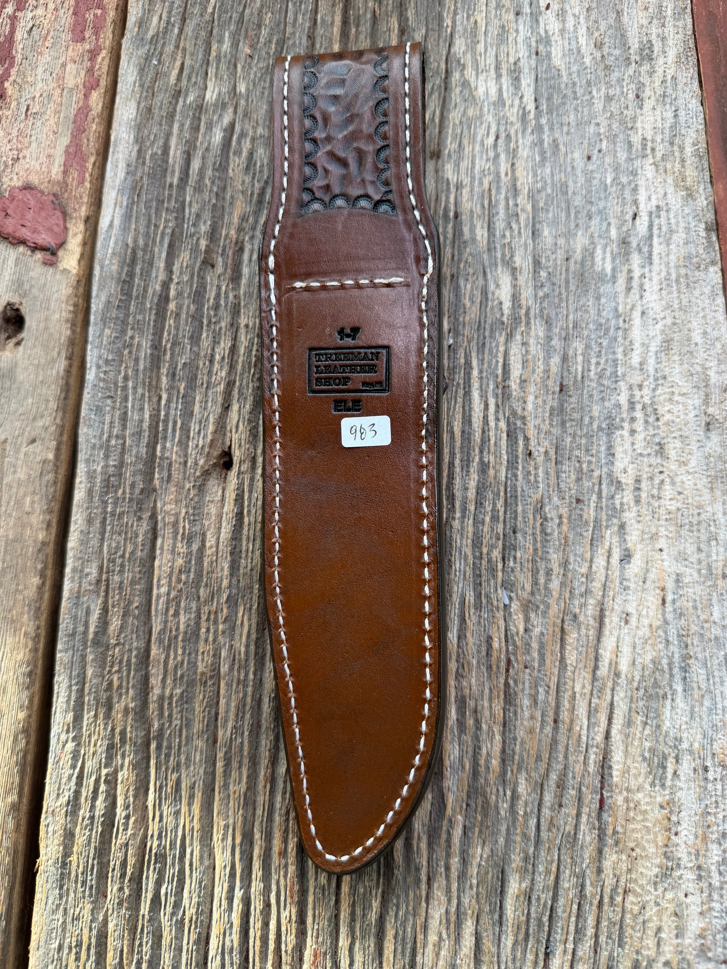 New Randall Model 1-7 Sheath in Exotic thick and textured Black and Grey Elephant Ear  on brown leather from Treeman with a silver Canteen snap. Hand tooled belt loop. Killer sheath.