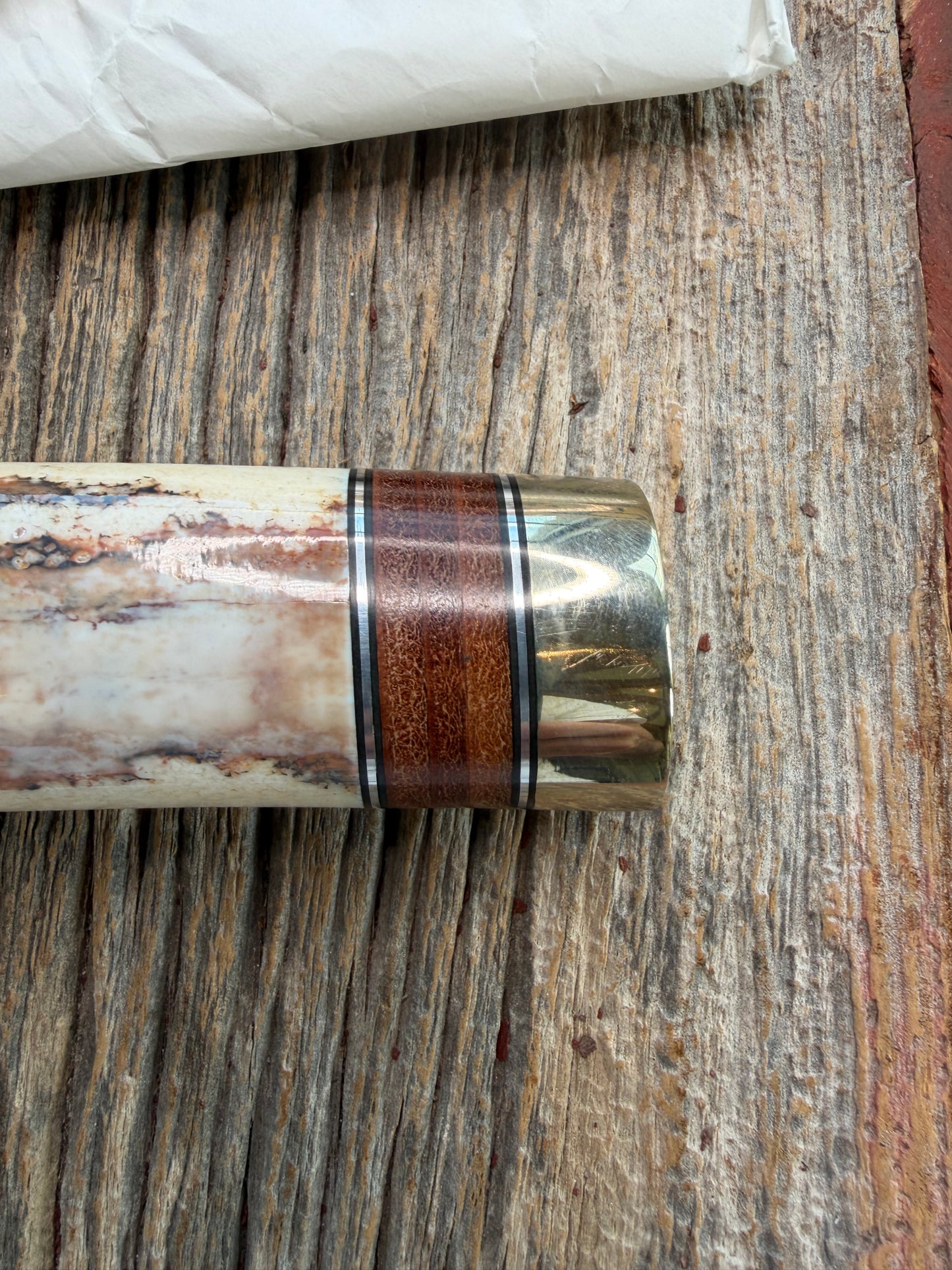 New in Paper Randall Model 12-9 Fossil Walrus Ivory and 25 style stacked Leather grip. Double Nickel Silver hilt and nickel butt cap.