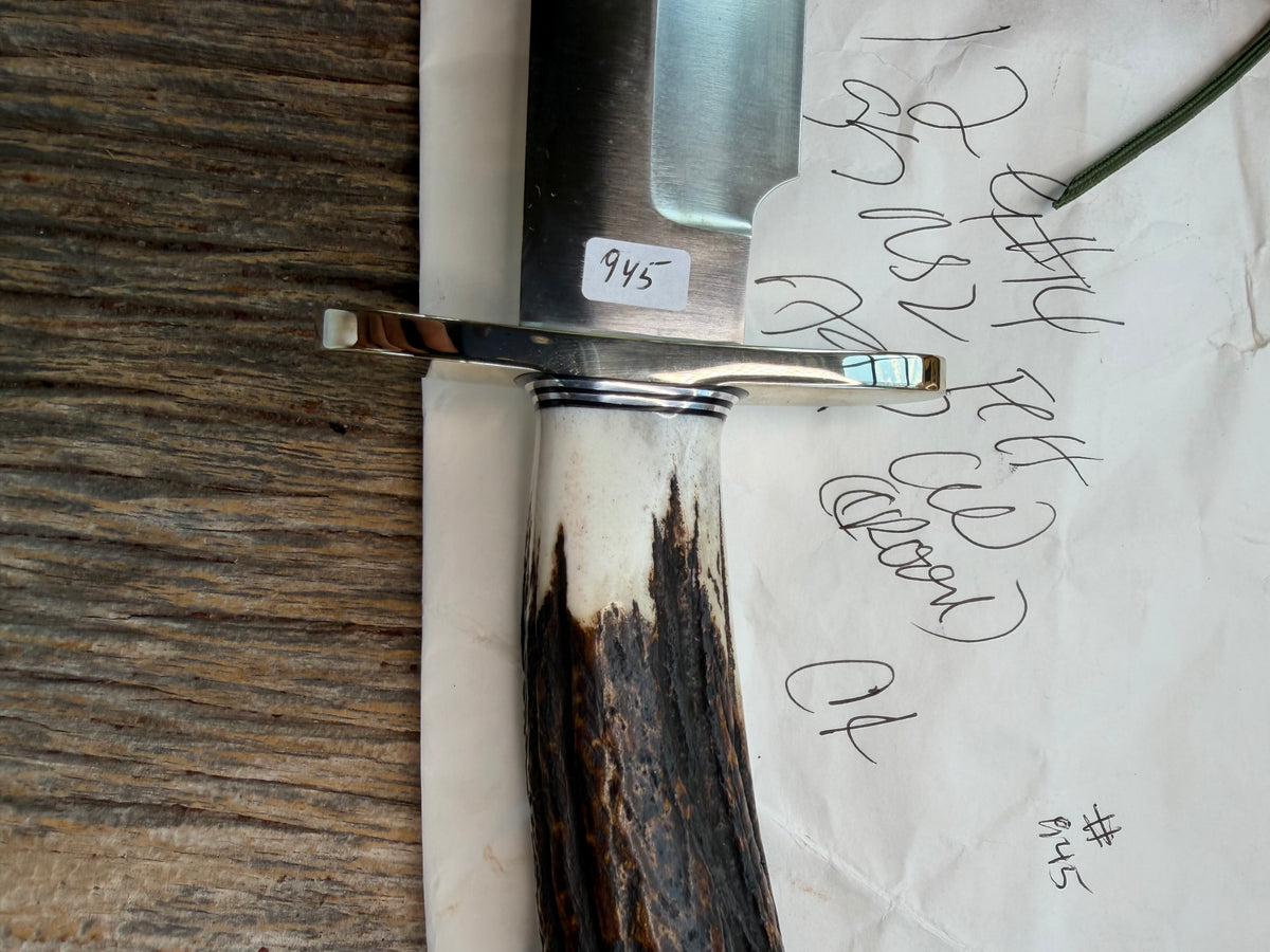 New in Paper Randall Model 12-9/14 Grind with a really nice piece of Crown stag. SS, Nickel Silver Hilt black and Aluminum  spacers.