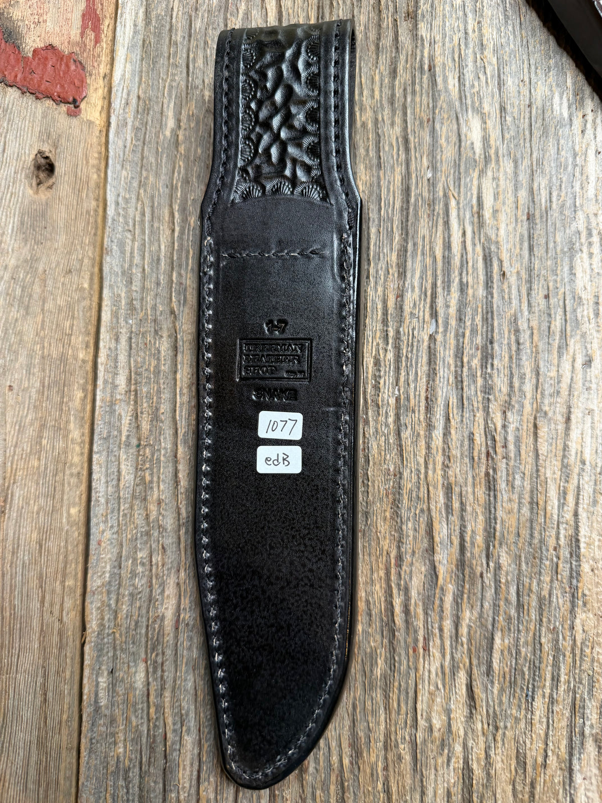 Randall Model 1-7 sheath with an Eastern Diamondback RattleSnake skin from Treeman Sheaths. Hand tooled belt loop, canteen snap. One the hardest skins to source.