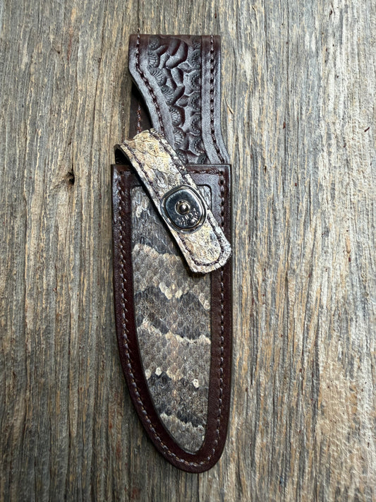 Randall Model Combat Companion sheath with a Canebrake RattleSnake skin from Treeman Sheaths. Vibrant colors and along side Copperheads the hardest skin to source.