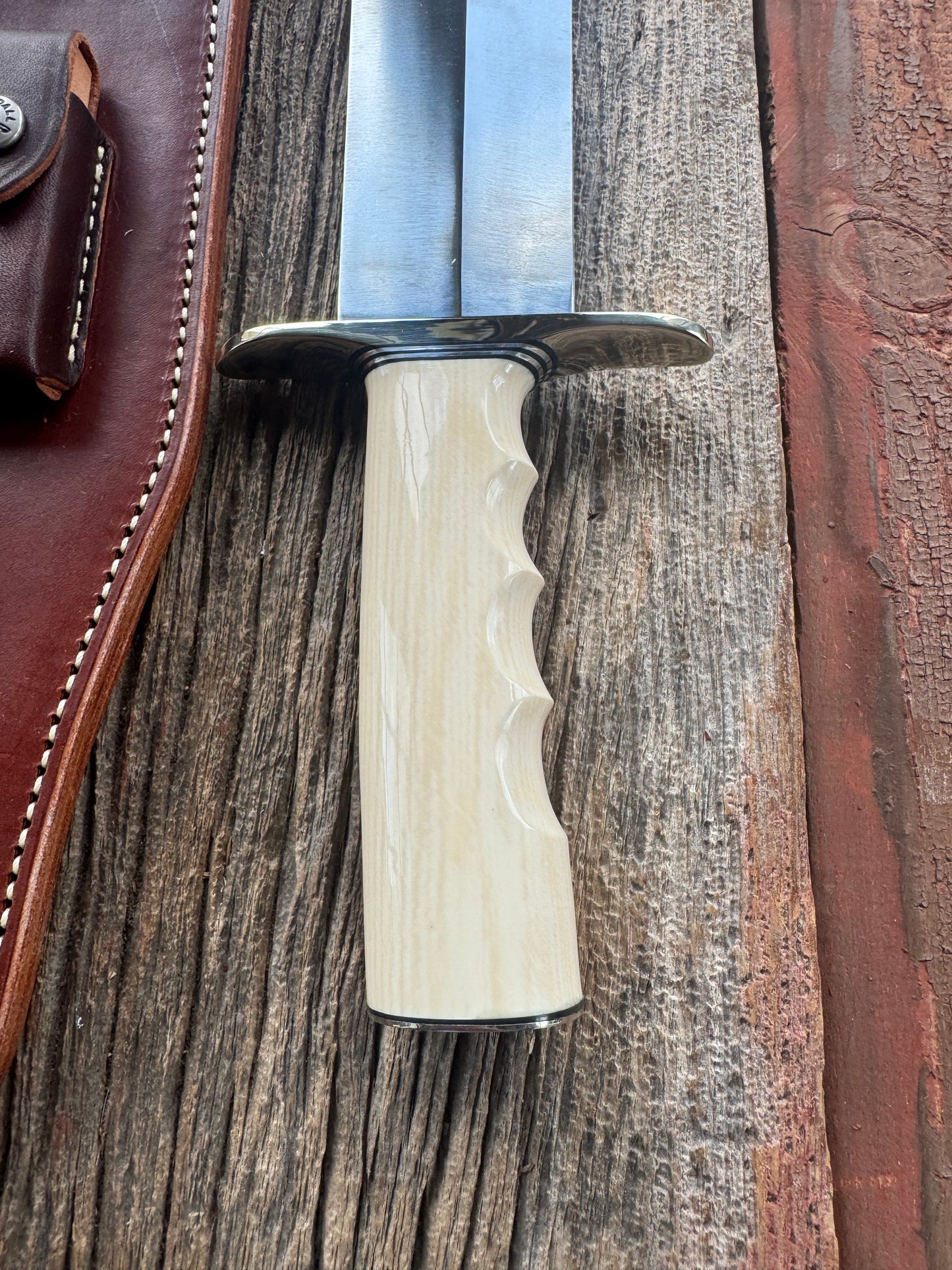 New in Paper Model 12-11 Smithsonian “Smitty” Bowie. Beautiful Dave Warthers Resin with finger grooves and a Nickel silver hilt and butt plate.