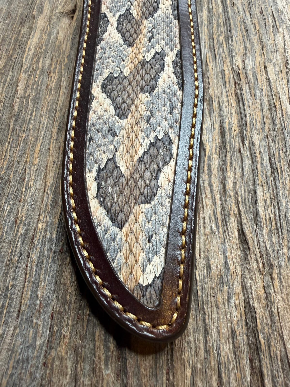 Randall Model 1-8 sheath with a Canebrake RattleSnake skin from Treeman Sheaths. Vibrant colors and along side Copperheads the hardest skin to source.