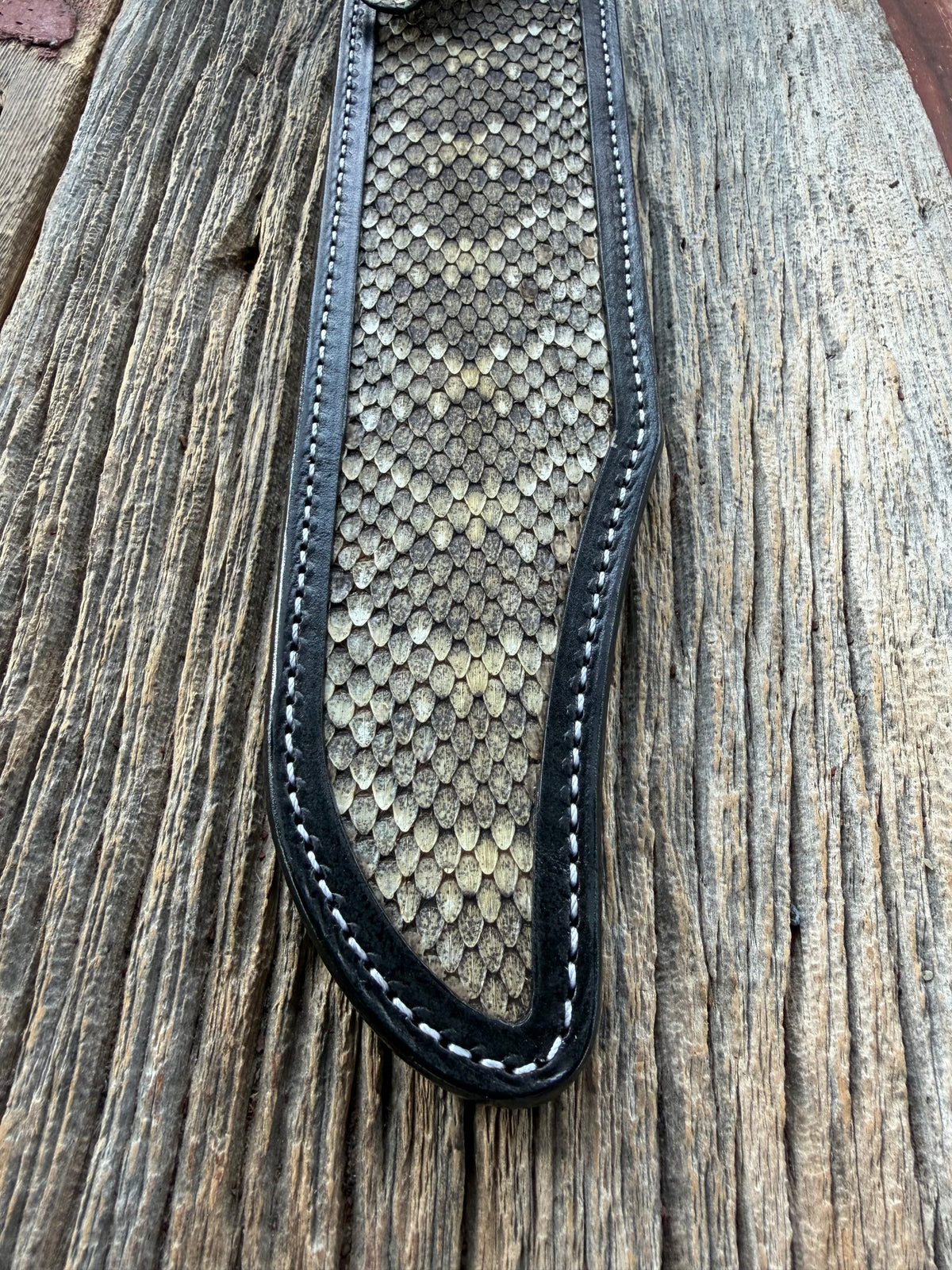 Randall Model Confederate sheath with inlayed Western Diamondback RattleSnake skin from Treeman Sheaths. Very dark skin on brown leather, white deviated stitching and black canteen snaps.