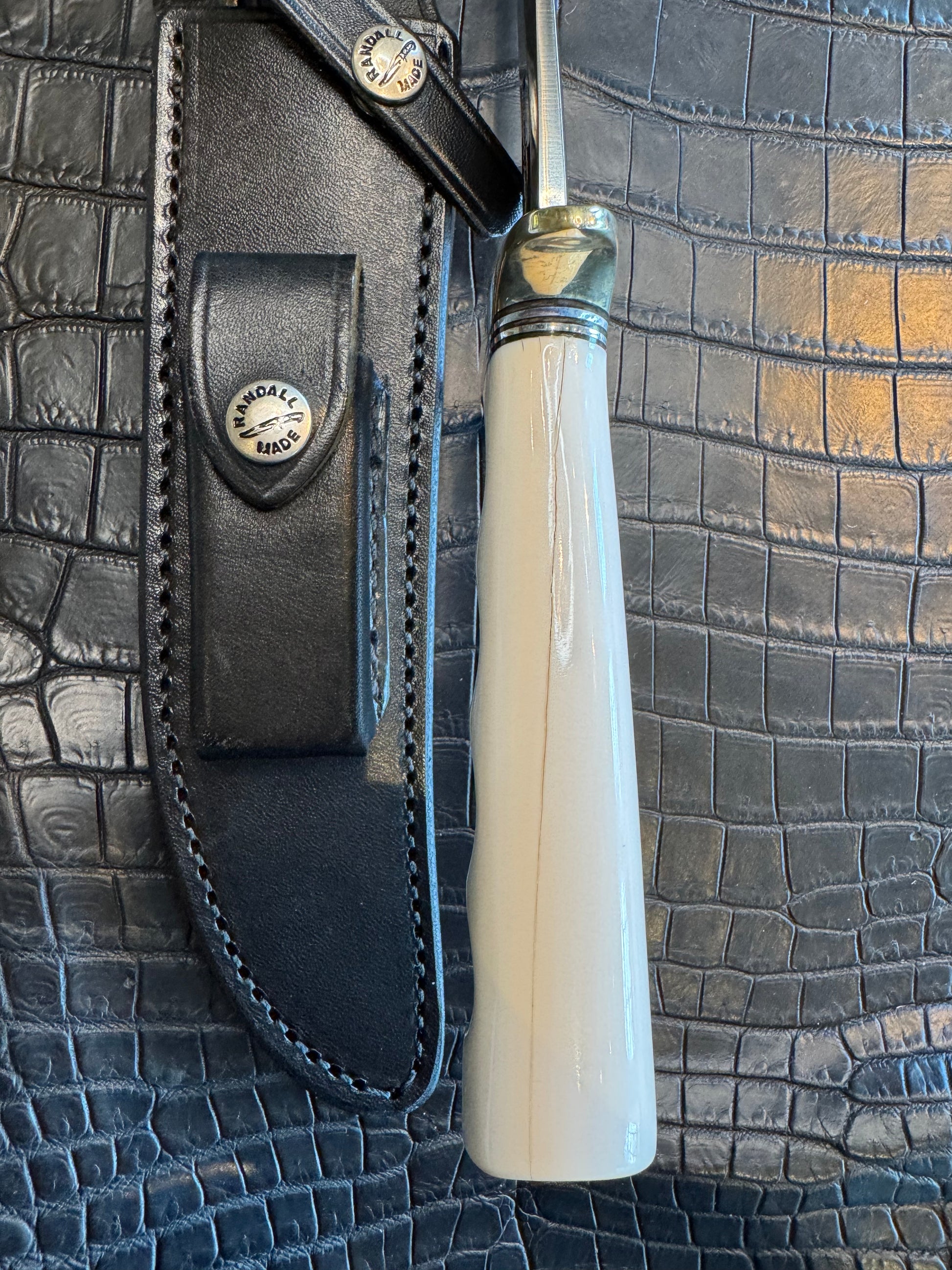 Randall Model 3-7 in Elephant Ivory with finger grooves and a natural end. Nickel Silver Hilt