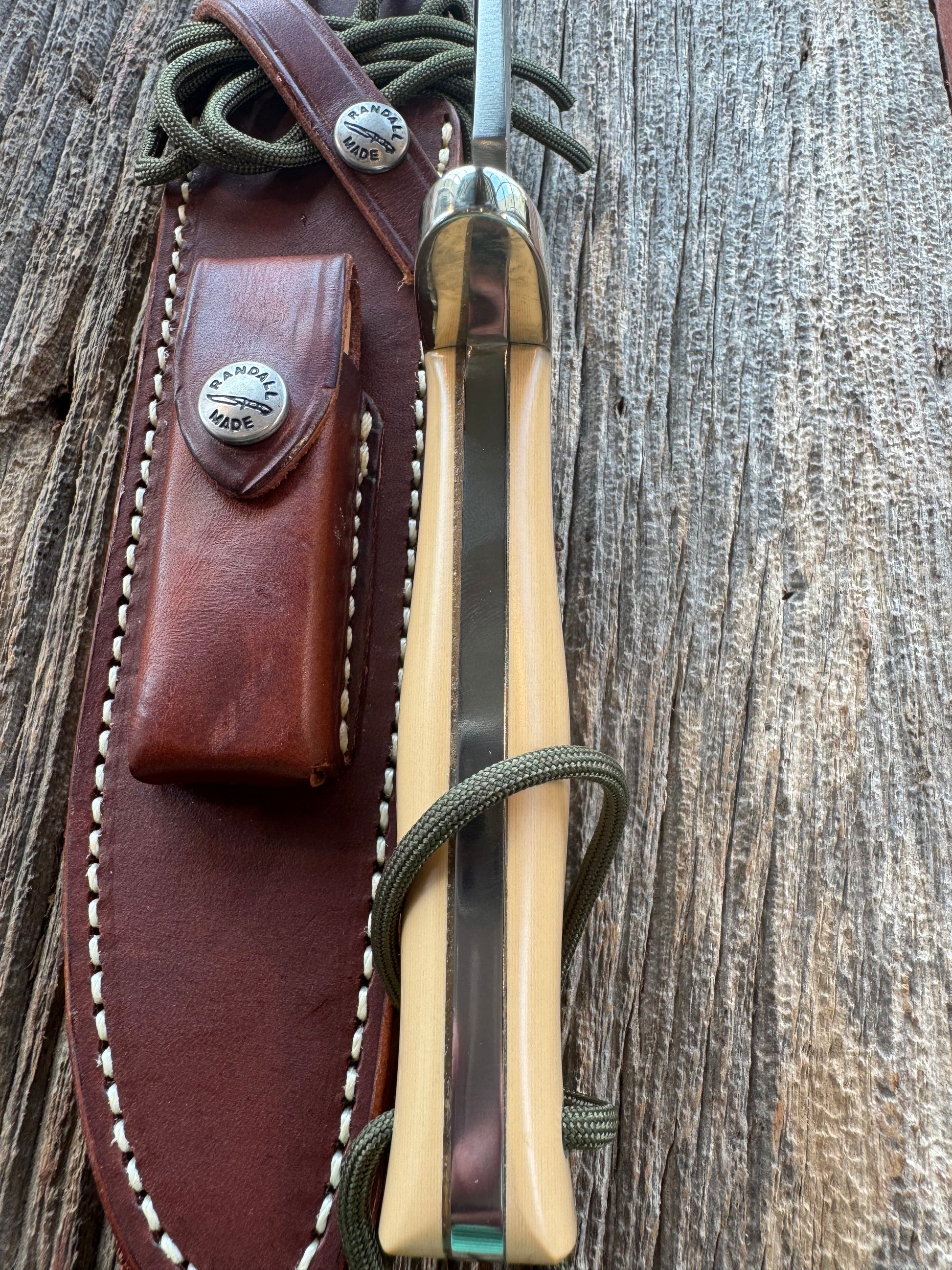 Randall Model 16-7 in Tan Micarta. Nickel Silver Hilt, Stainless steel and Lanyard. New in Paper.