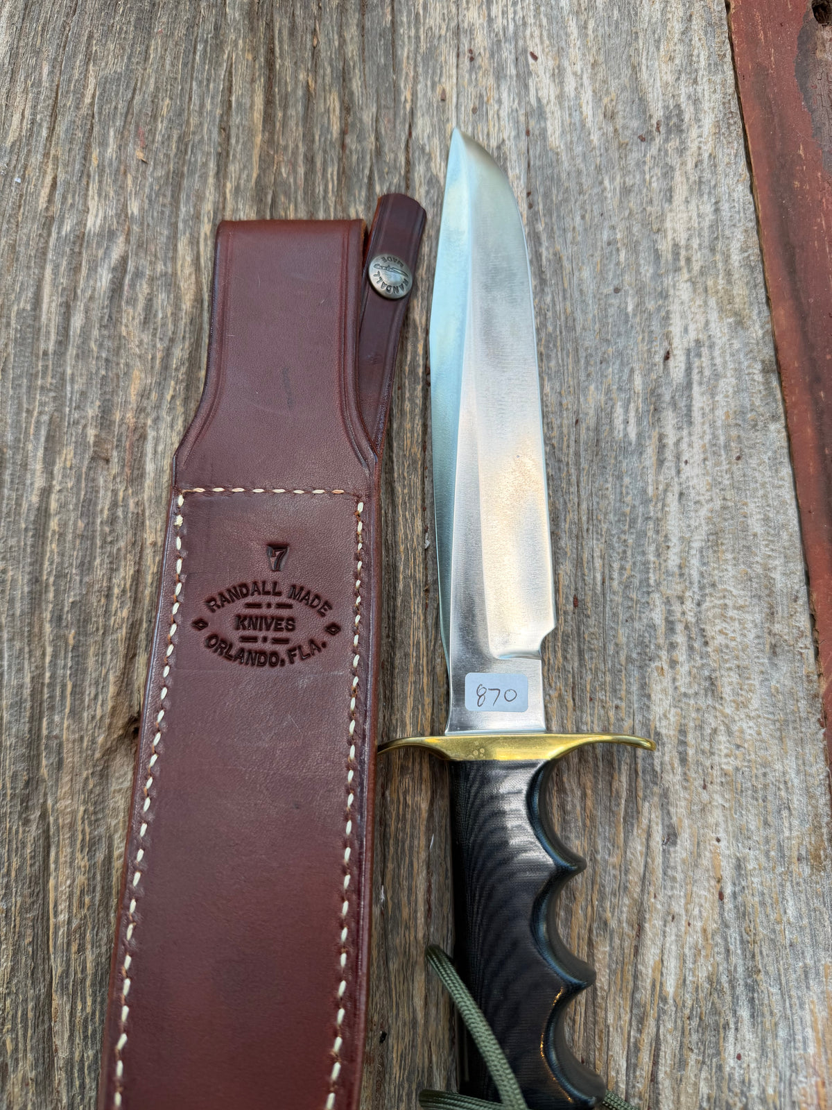 Nice Randall Model 16-7 with a Black  Micarta handle. SS blade, brass hilt. Lanyard. Brown leather sheath.