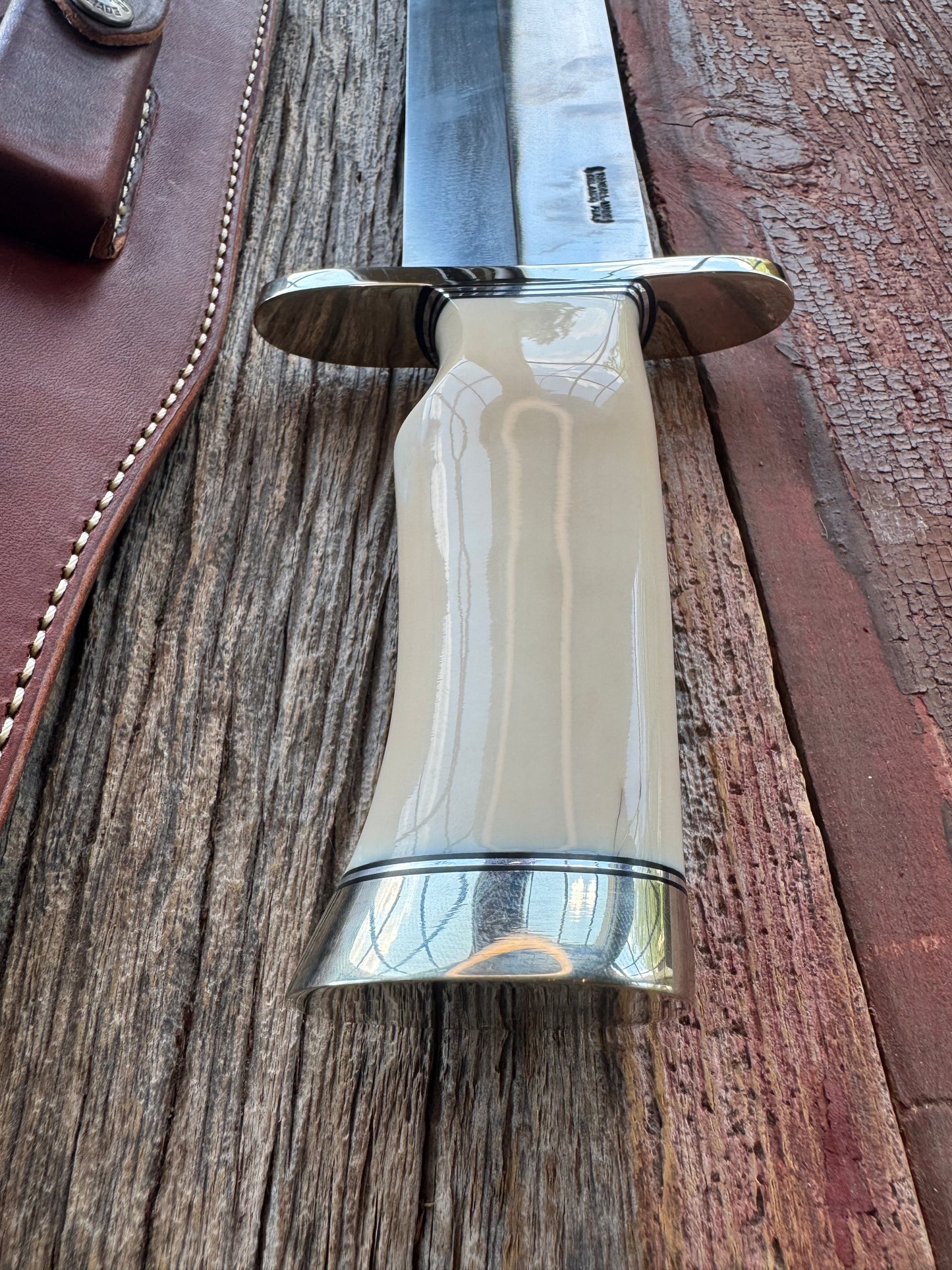 New in Paper Model 12-11 Smithsonian “Smitty” Bowie. Beautiful creamy Fossil Walrus Ivory with a single finger grip and a Nickel  Silver forward curved hilt and butt cap. Unreal Scrim opportunity!! Blank Canvas..
